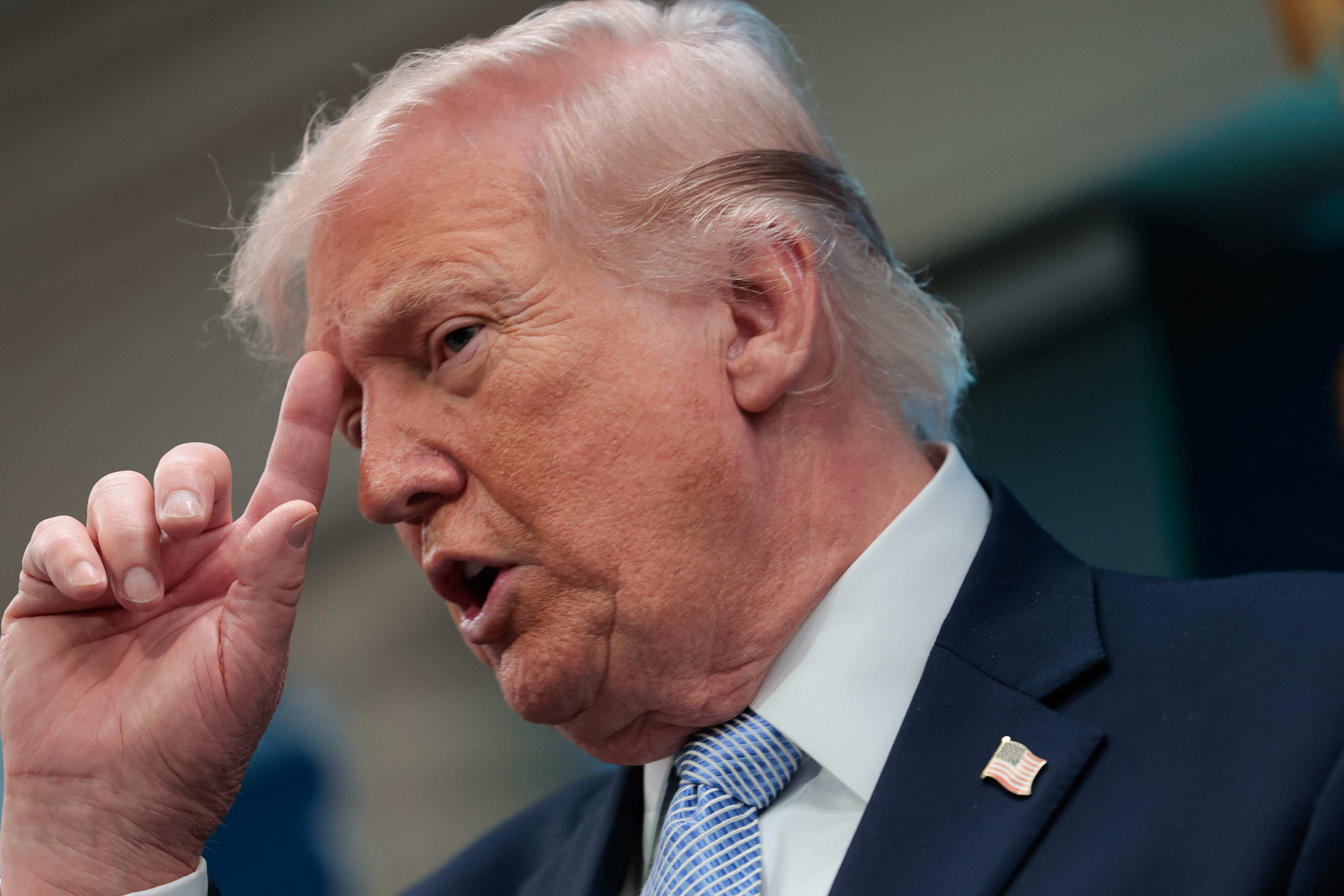 US President Donald Trump gestures as he speaks about the conflict in Iran at the White House on April 6. Photo: AFP