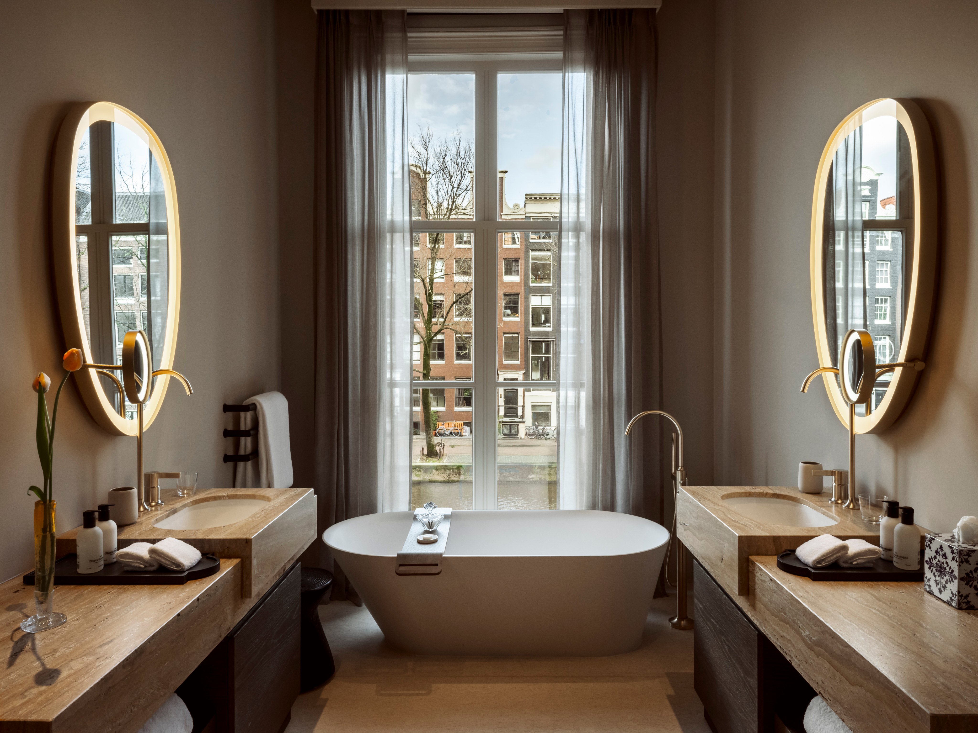 A bathroom in a suite overlooking a canal at Rosewood Amsterdam. Photo: Handout