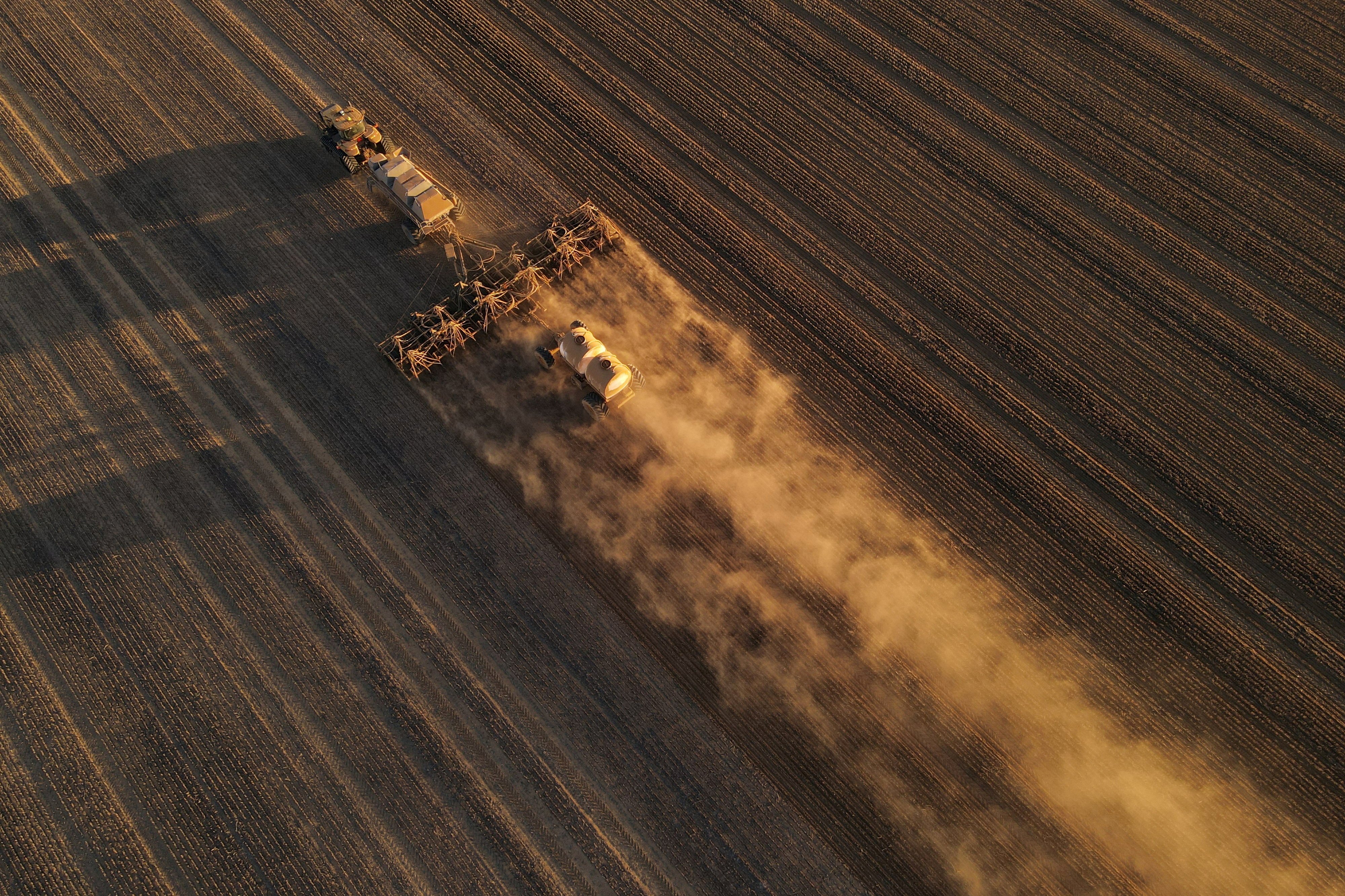 A seeder sows wheat at a farm in Bencubbin, Australia. Photo: Reuters