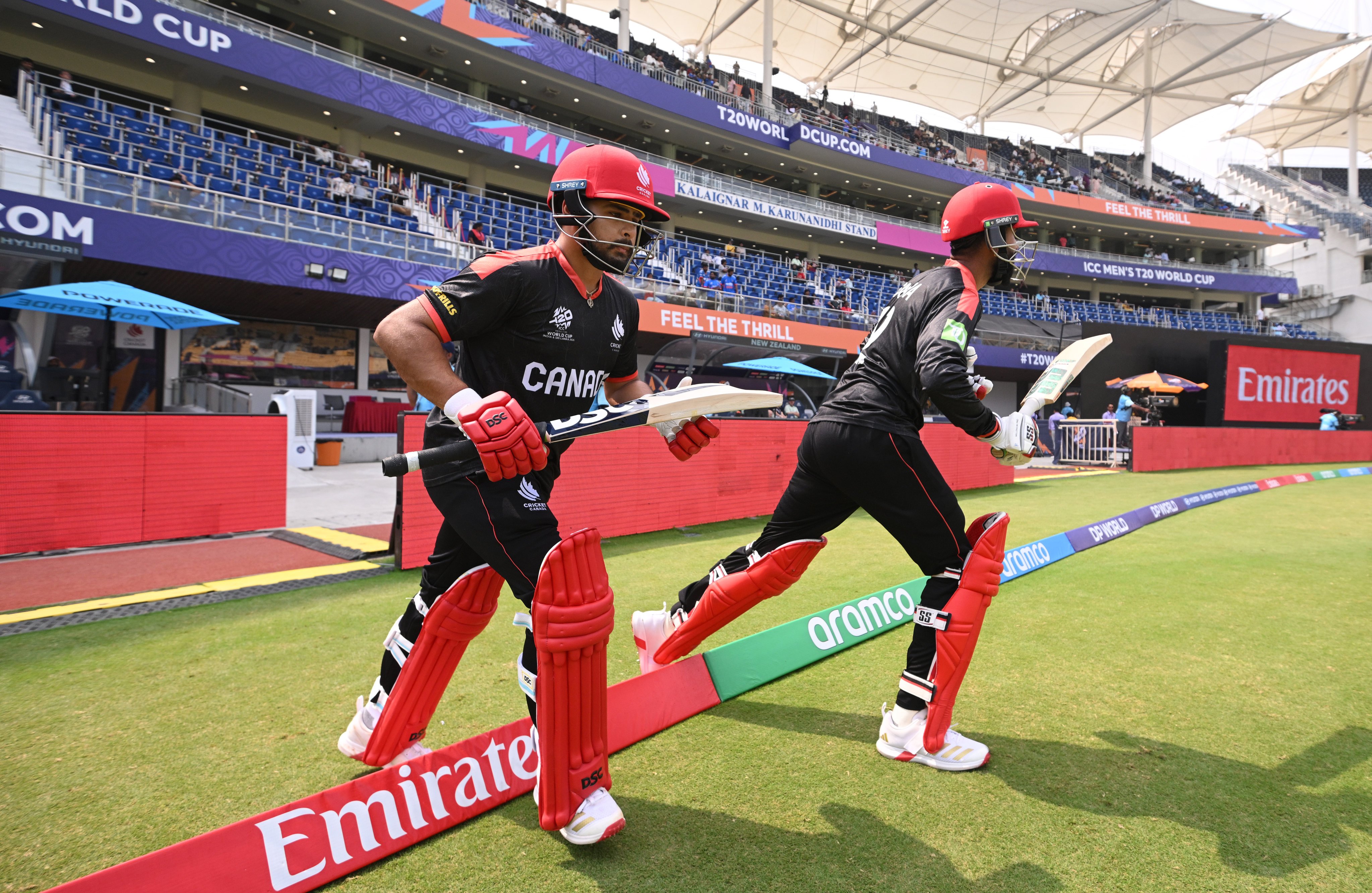 Dilpreet Bajwa (left) and Yuvraj Samra of Canada make their way out to bat during the T20 World Cup match against New Zealand in February in Chennai, India. Photo: Getty Images