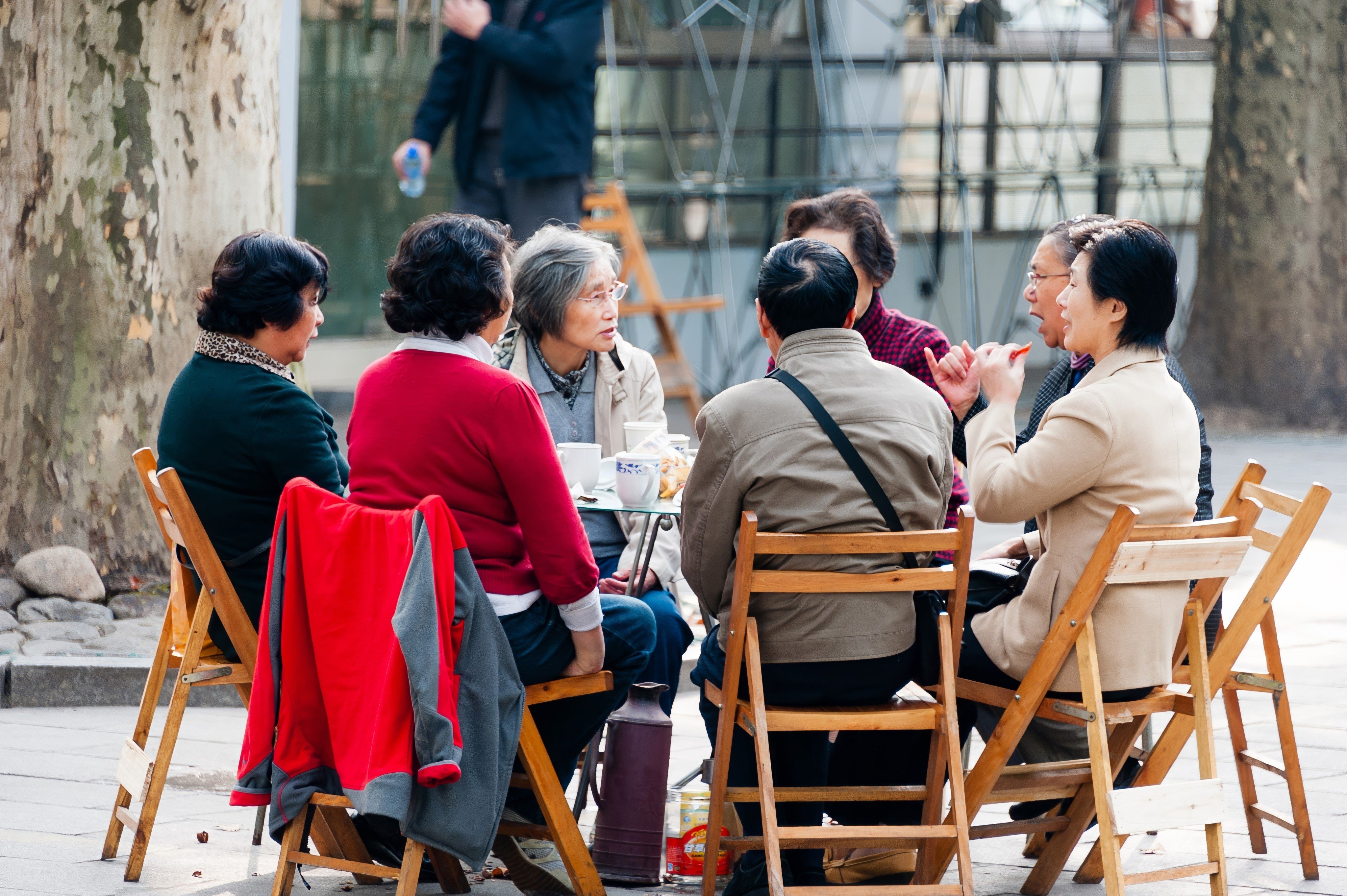 A group of older Chinese people gather at Shanghai’s Fuxing Park. The city is now encouraging seniors to return to work. Photo: Shutterstock