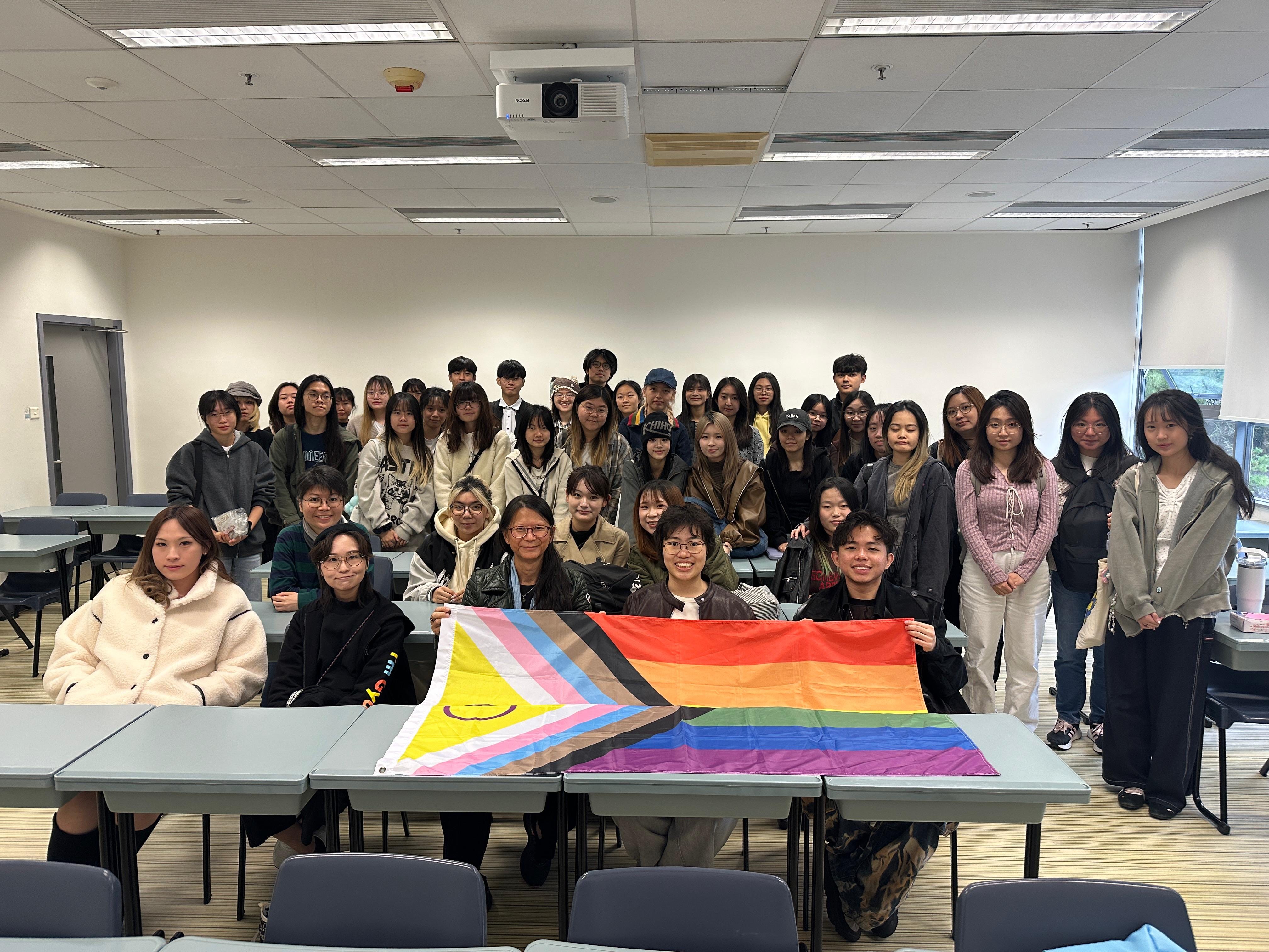 Liam Mak from transgender youth support group Quarks, with CUHK students. Photo: Handout