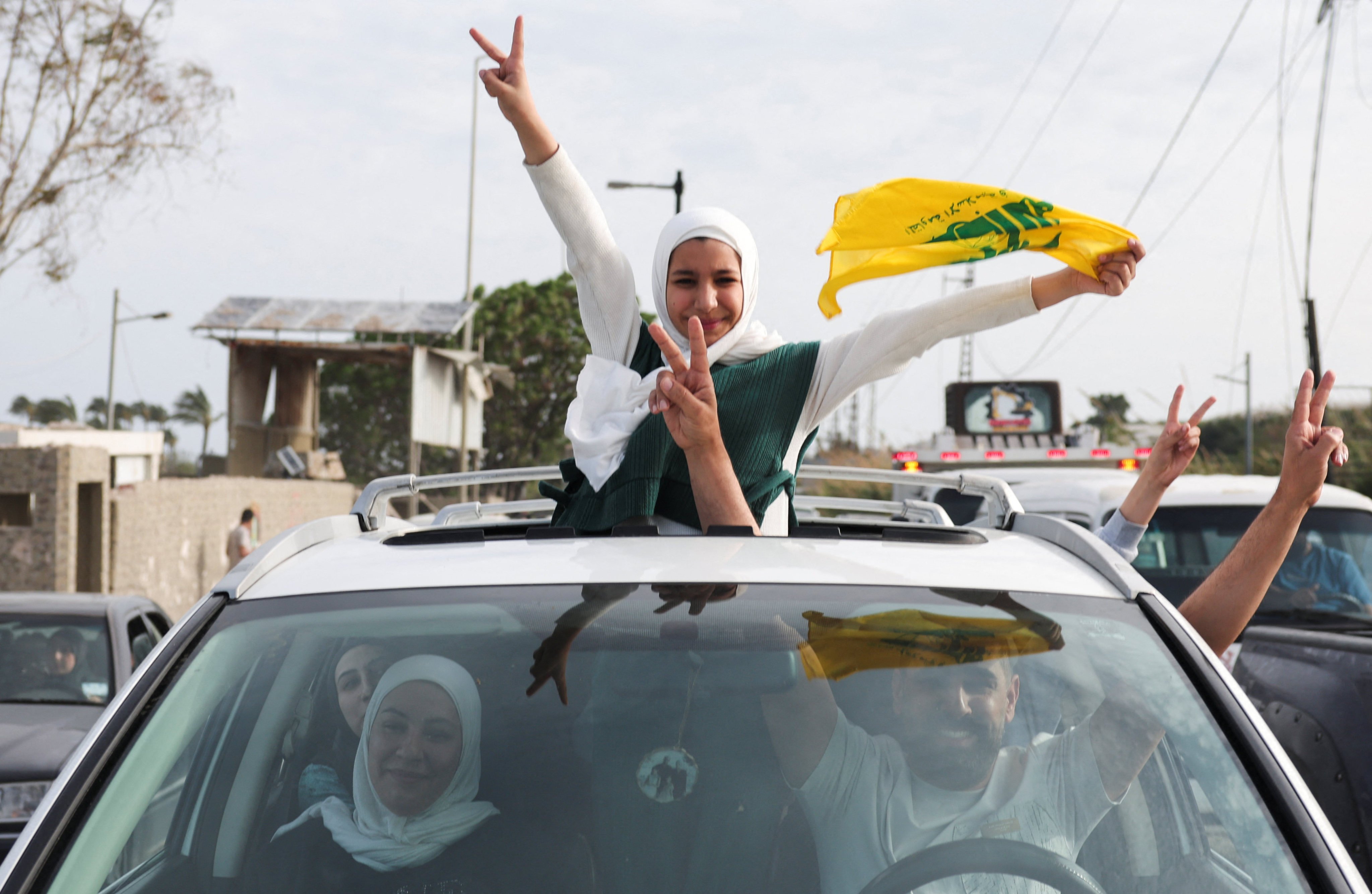 Displaced people make their way back to their home on Friday crossing the bridge in Qasmiyeh linking southern Lebanon to the rest of the country as a 10-day ceasefire between Lebanon and Israel went into effect. Photo: Reuters