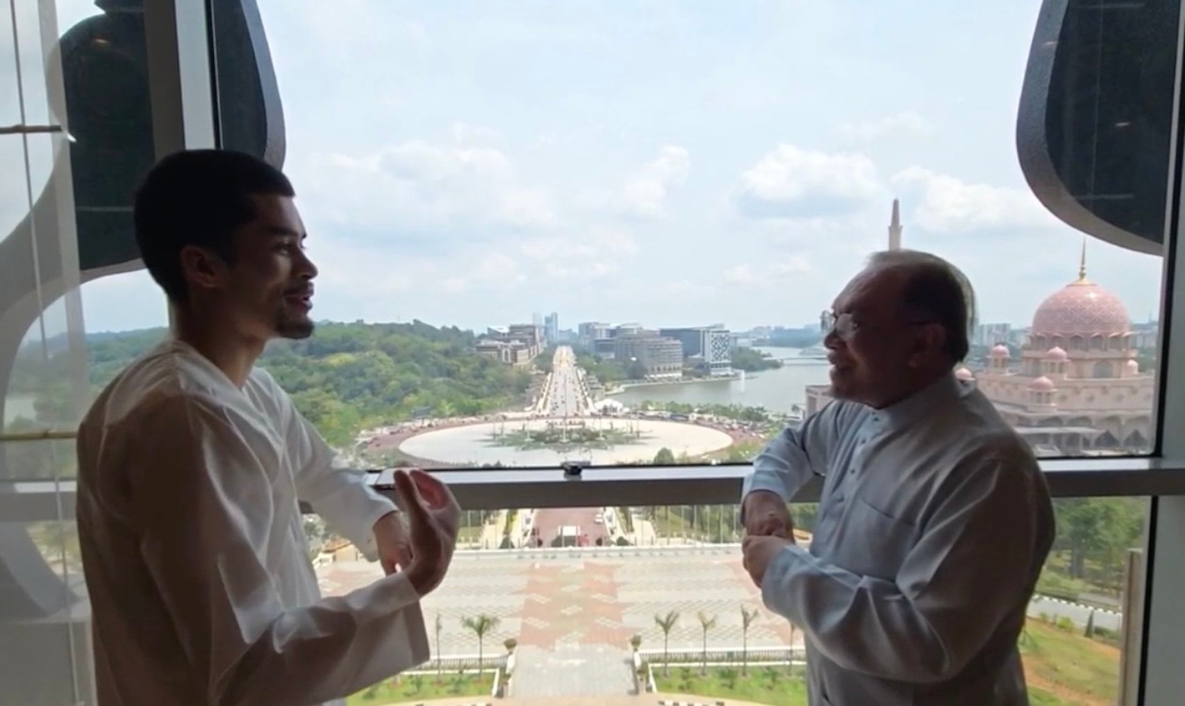 Malaysian Prime Minister Anwar Ibrahim speaks with American streamer Sneako on a wide range of issues in Putrajaya on Friday. Photo: Kick/Sneako