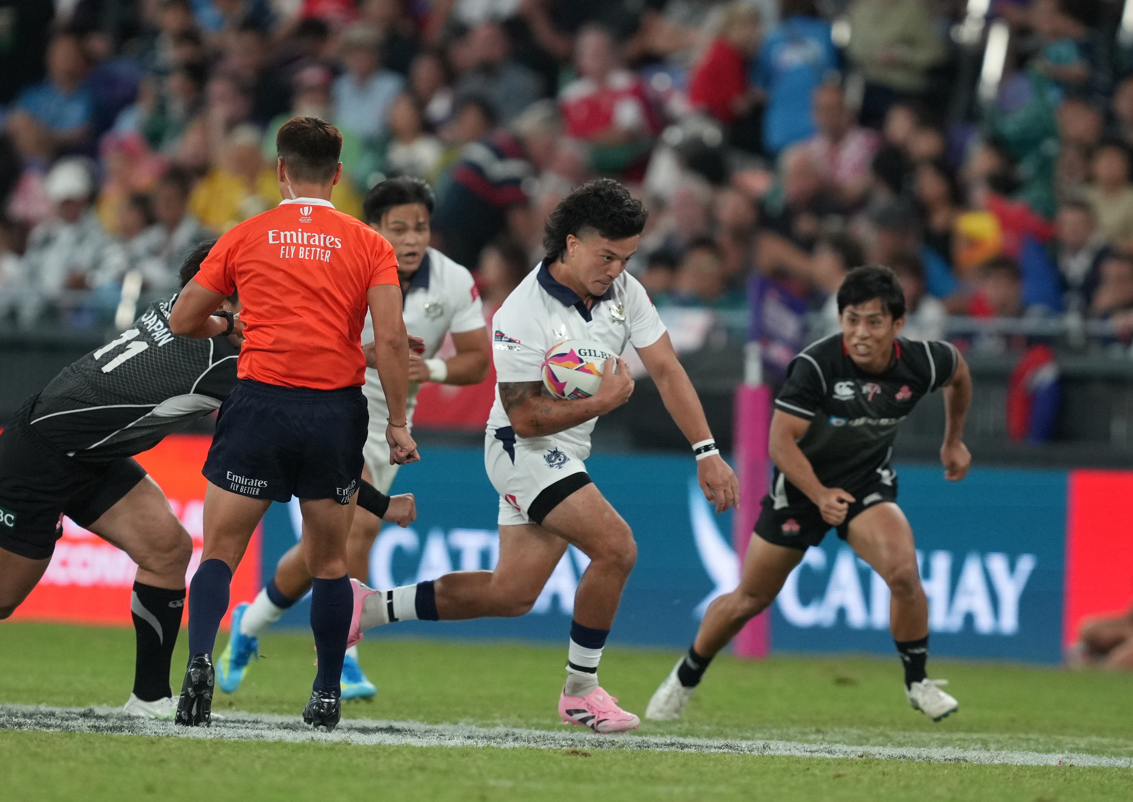 James Christie (centre) tries to take the attack to Japan during Hong Kong’s Melrose Claymores defeat. Photo: Sam Tsang