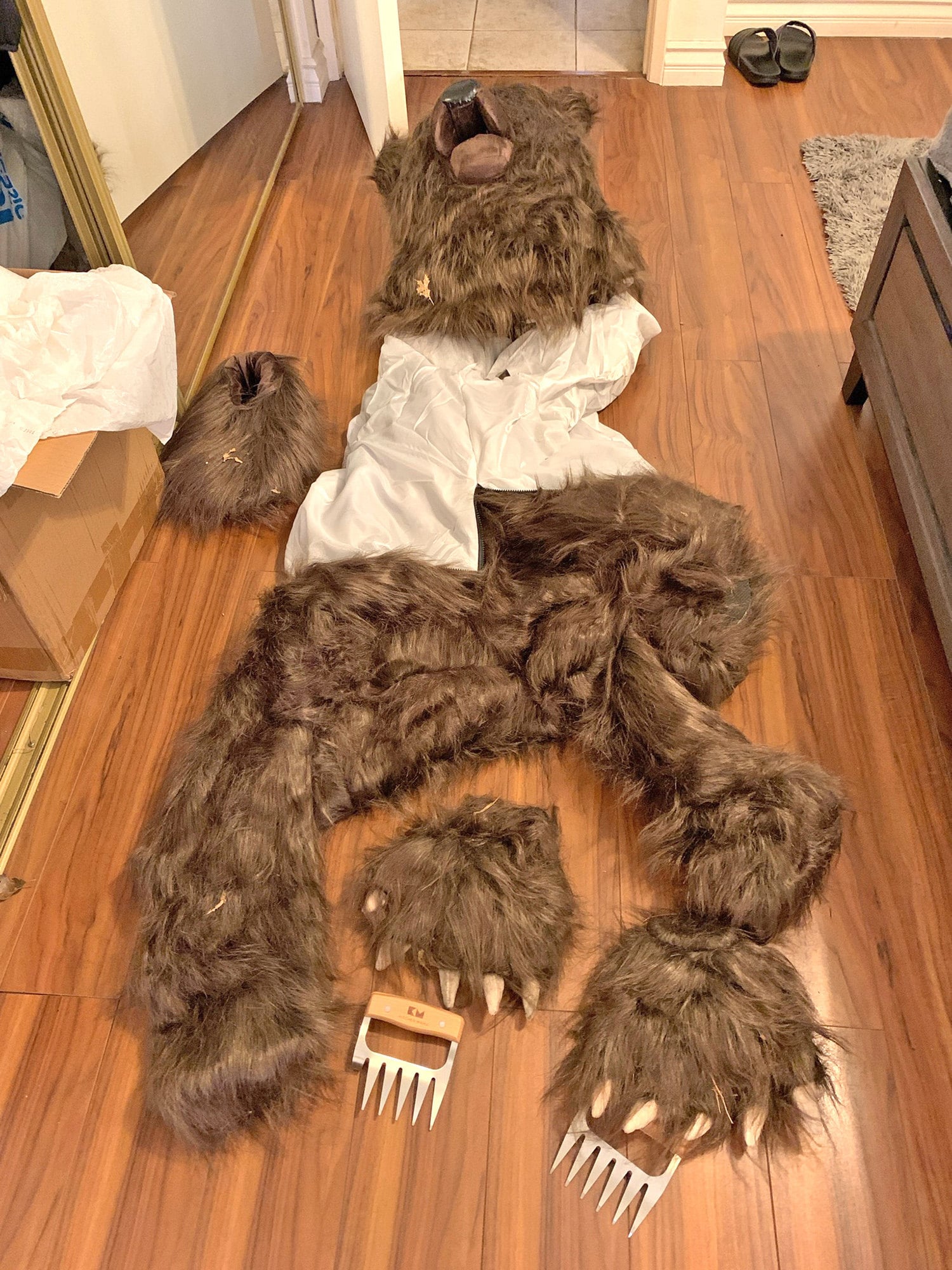 A bear suit is part of the evidence that has been used to convict three people for staged attacks on luxury cars for insurance payouts. Photo: California Department of Insurance/TNS