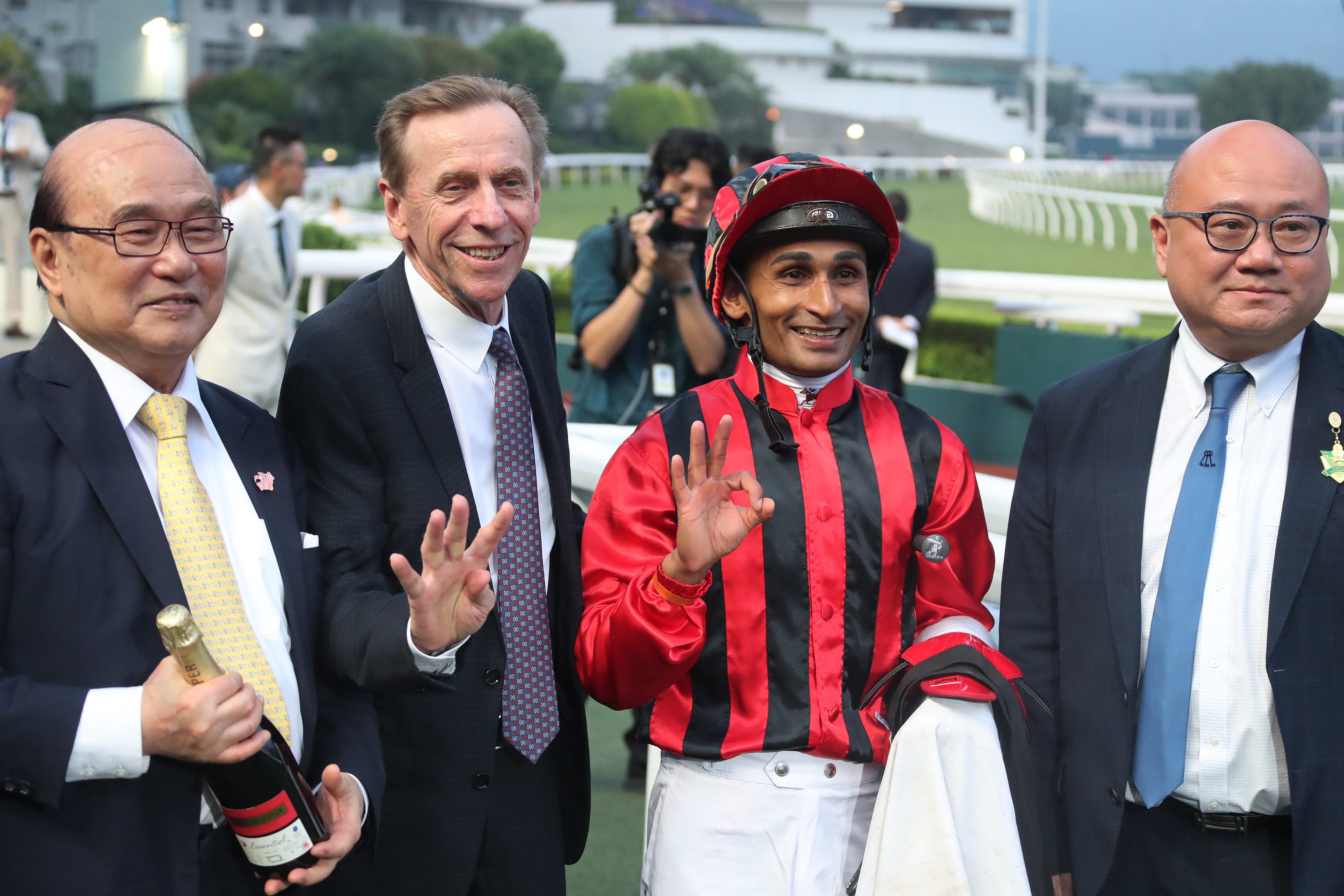 John Size (second left) and Karis Teetan celebrate Nautical Force’s win. Photos: Kenneth Chan
