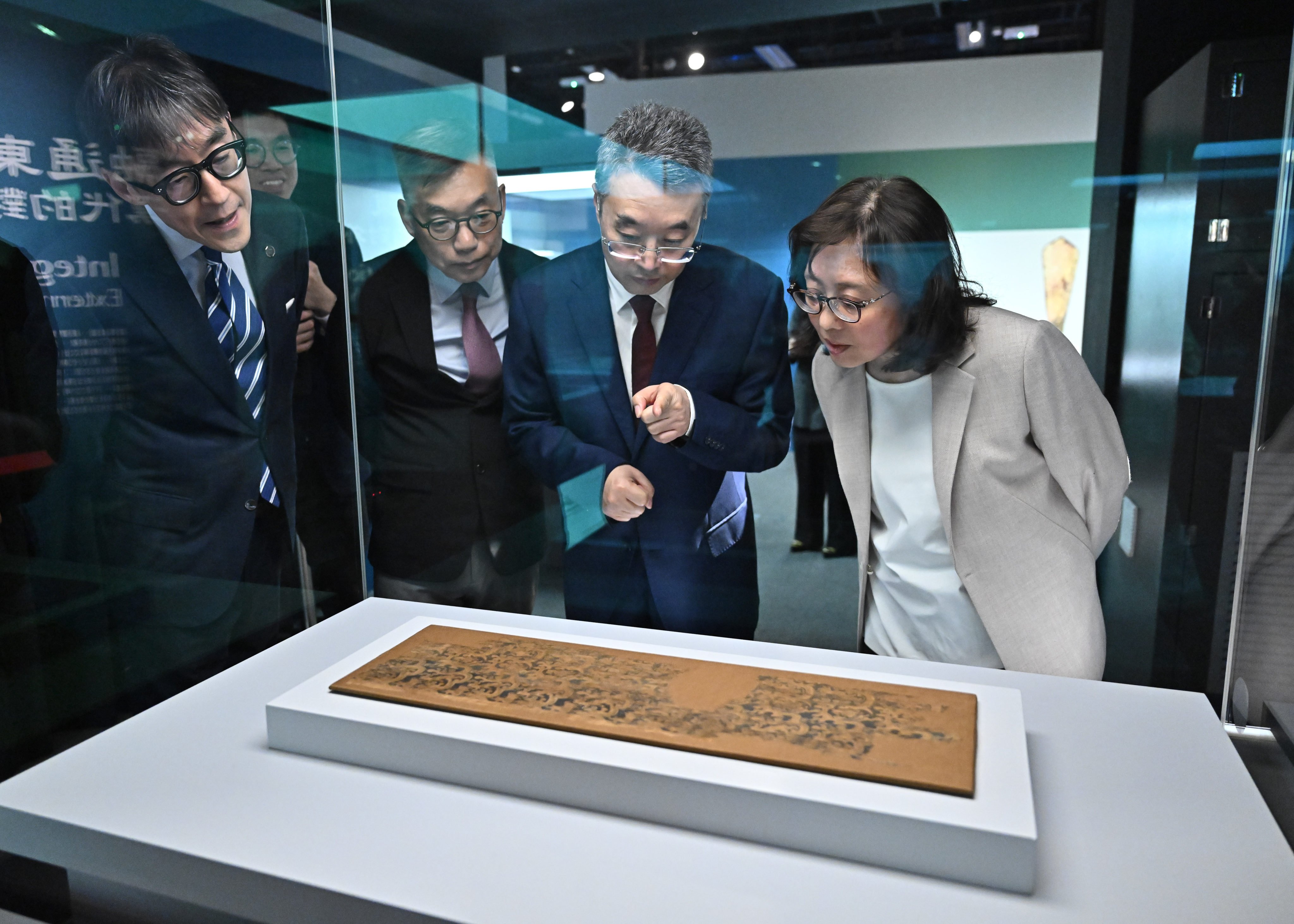 Secretary for Development Bernadette Linn (right) views a Han dynasty artefact. Photo: Handout