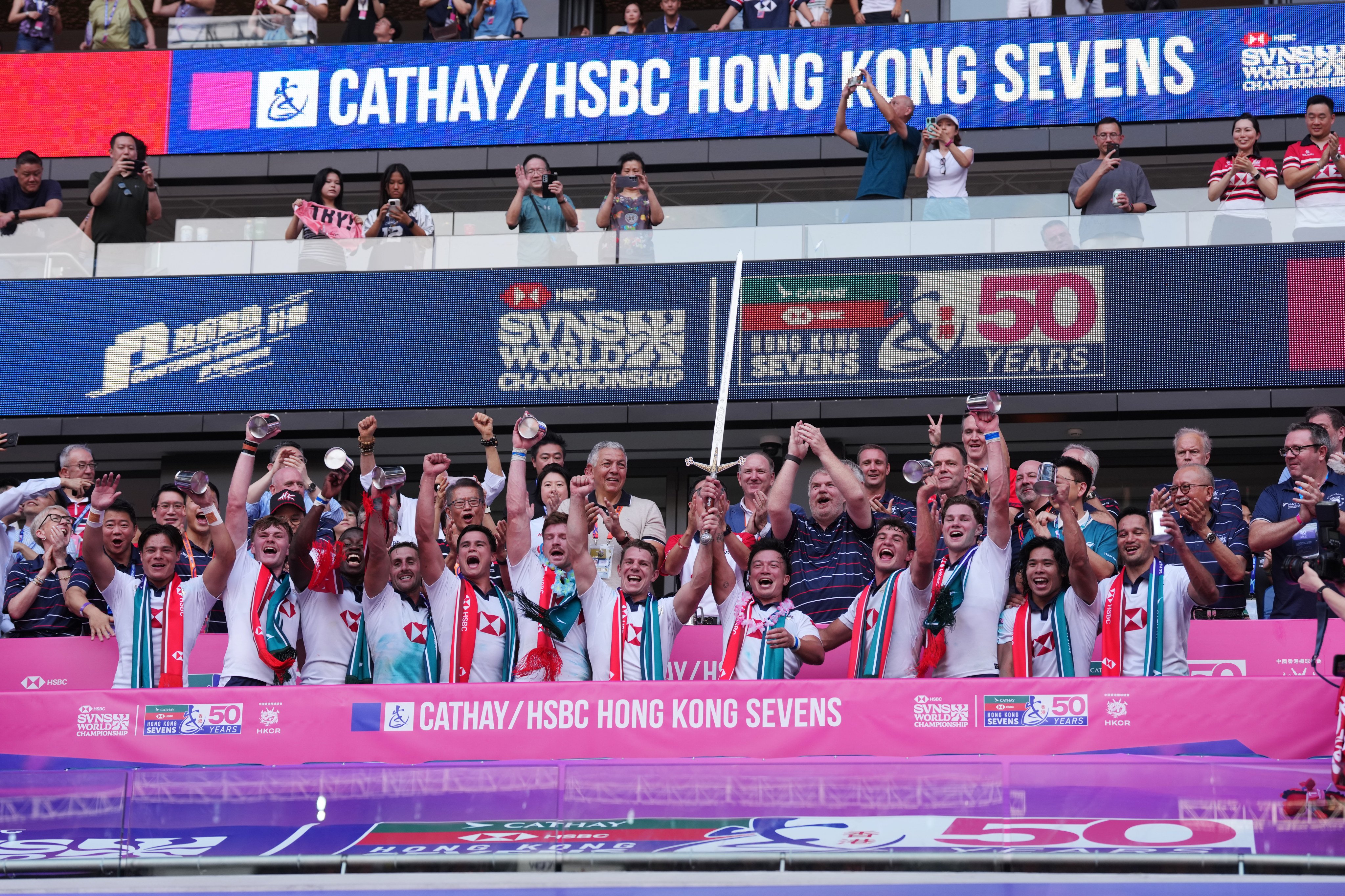 Hong Kong celebrate after winning the Melrose Claymores final for the third straight year at Kai Tak Stadium on Sunday. Photo: Karma Lo
