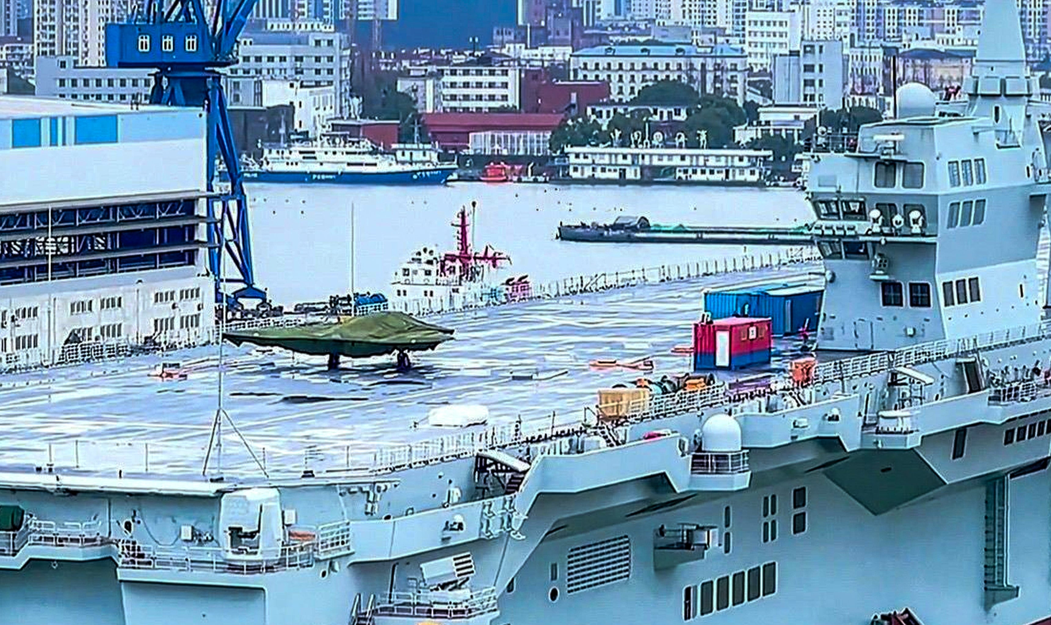 A GJ-21 stealth drone pictured on the deck of the Sichuan amphibious landing ship. Photo: Handout