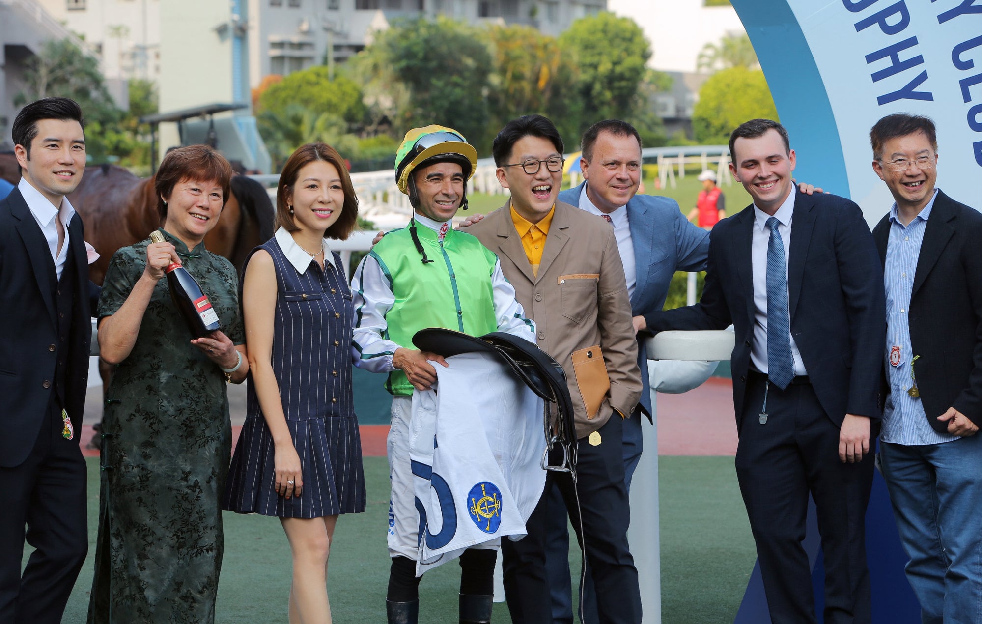 Jockey Joao Moreira and connections of Target Audience celebrate his first Hong Kong success.