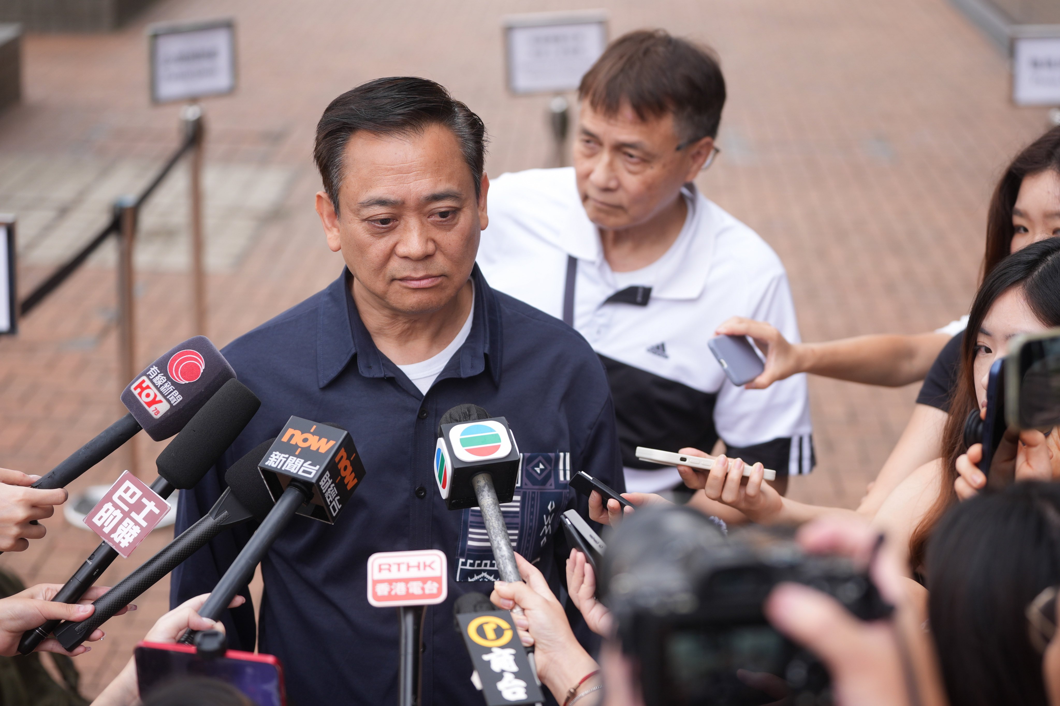 Jason Kong talks to the press after his testimony. Photo: Elson Li