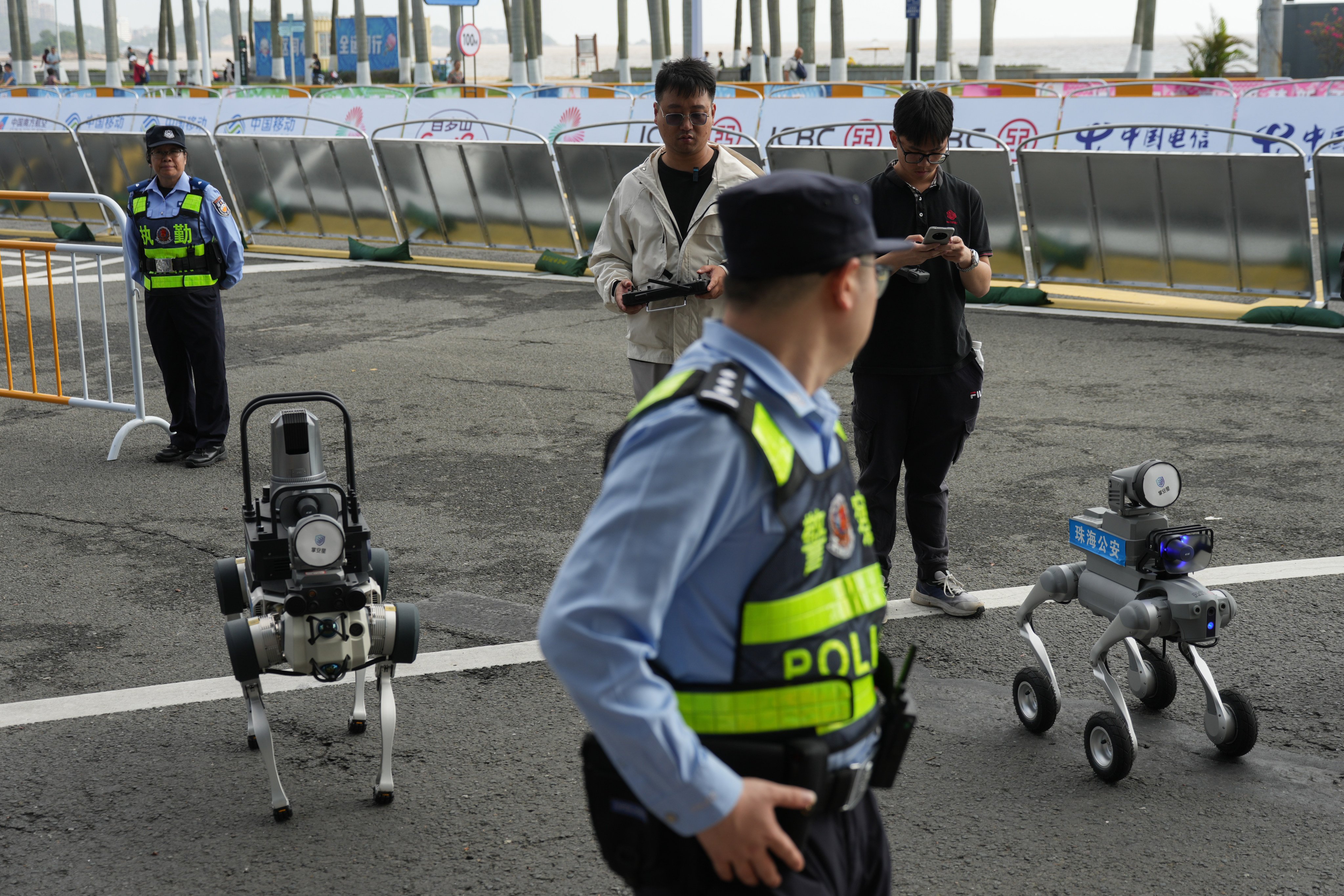 Chinese security forces could replace officers in riot gear with drone swarms and robot dogs during future civil unrest, according to engineers’ research. Photo: Eugene Lee