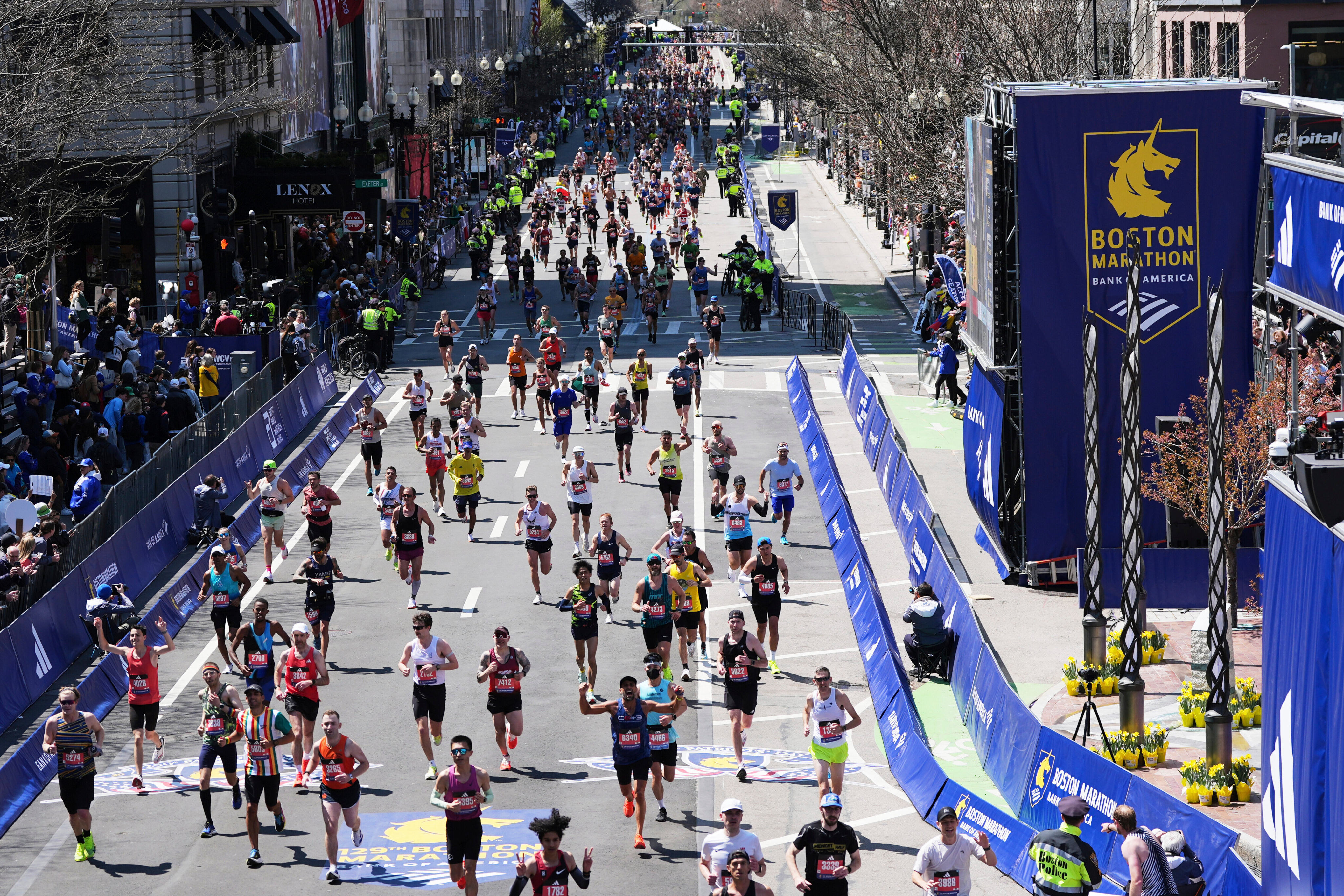 Runners approach the finish line for the 2025 Boston Marathon. Photo: AP