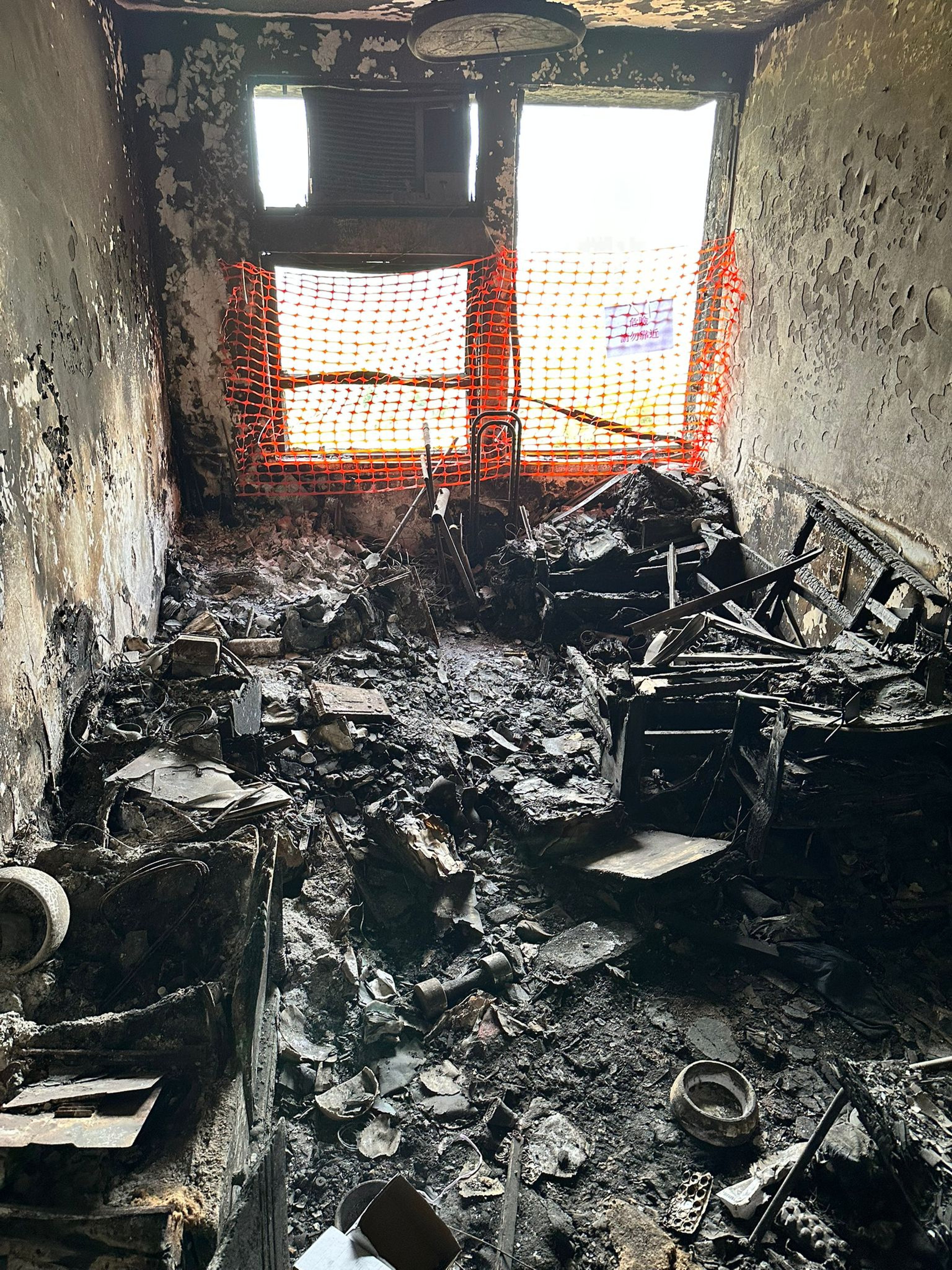 A resident surnamed Wong has said his seventh-floor flat in Wang Sun House was badly burnt. Photo: Handout