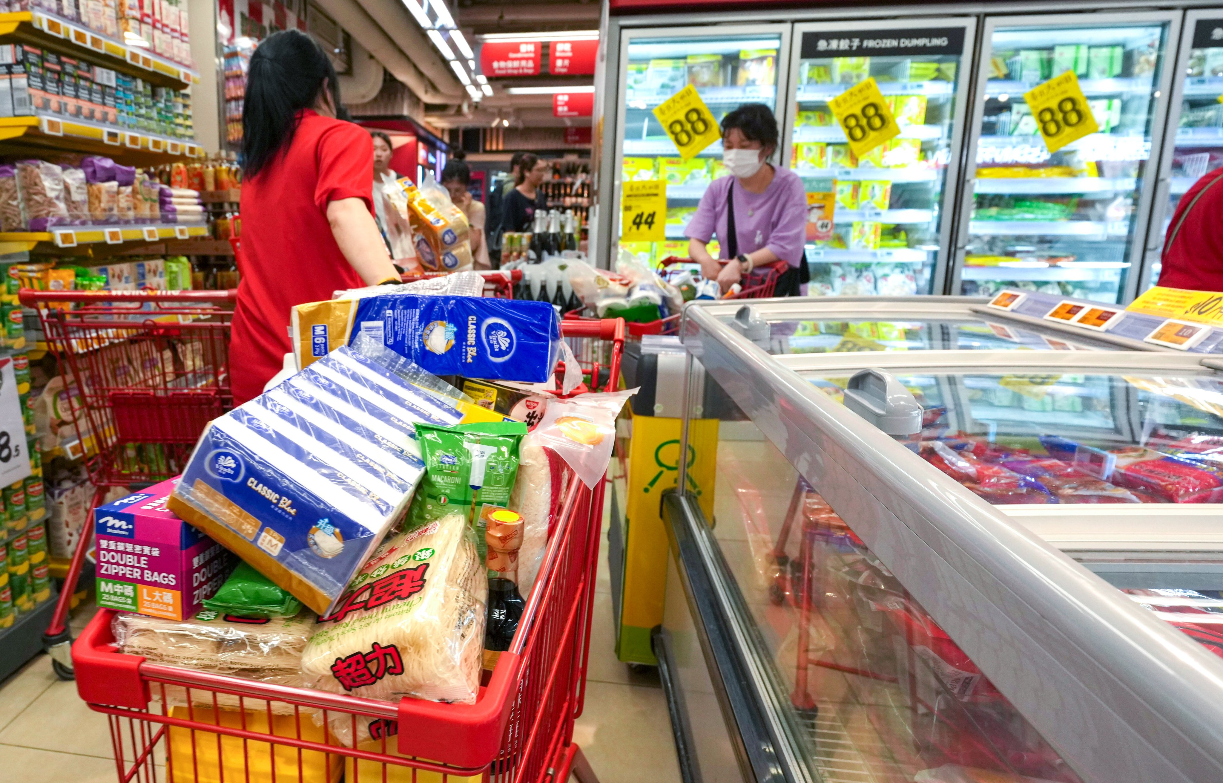 People shop at a supermarket in Causeway Bay. Photo: Jelly Tse