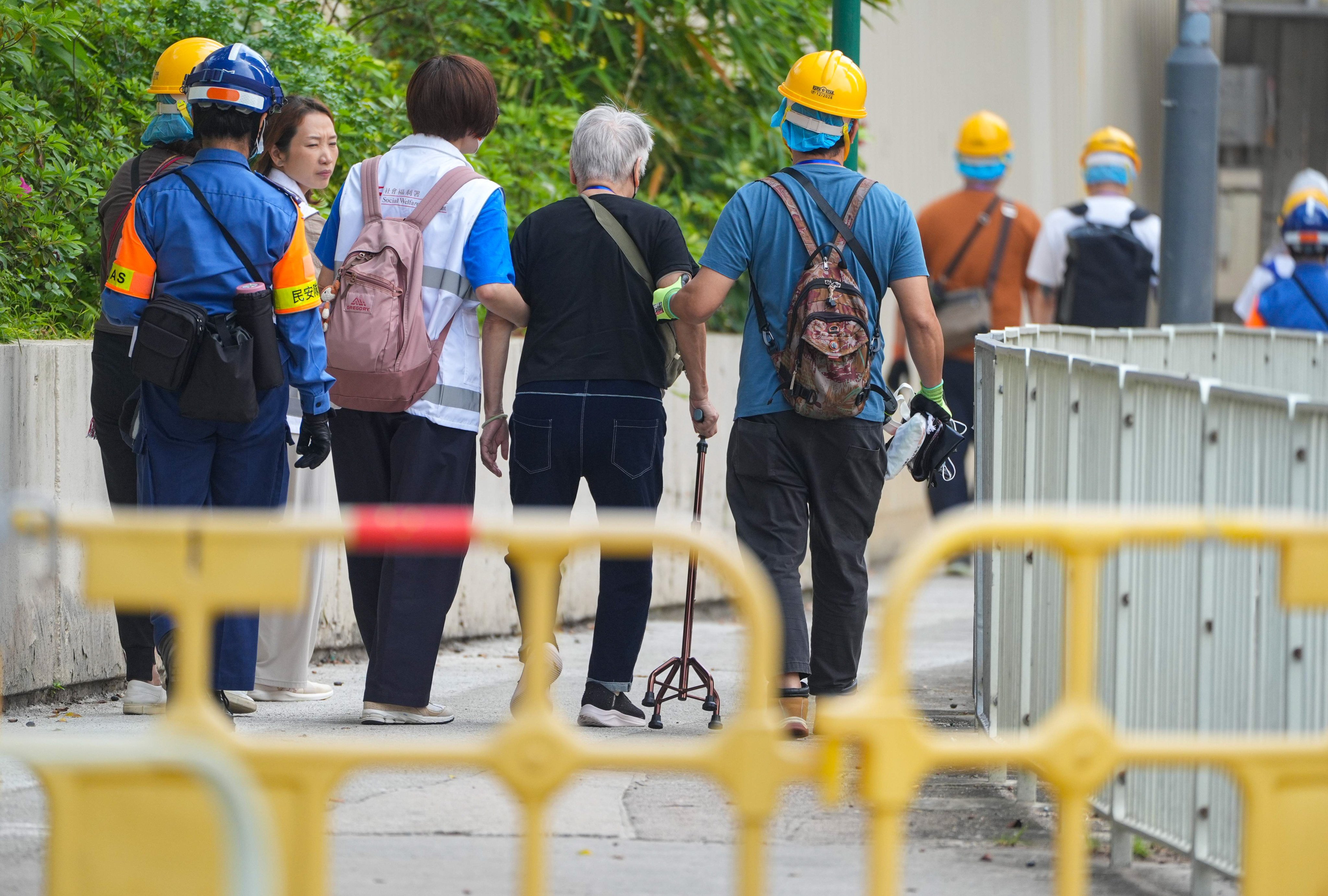 Wang Fuk Court residents return to their units on April 20, nearly five months after the deadly blaze. Photo: Eugene Lee