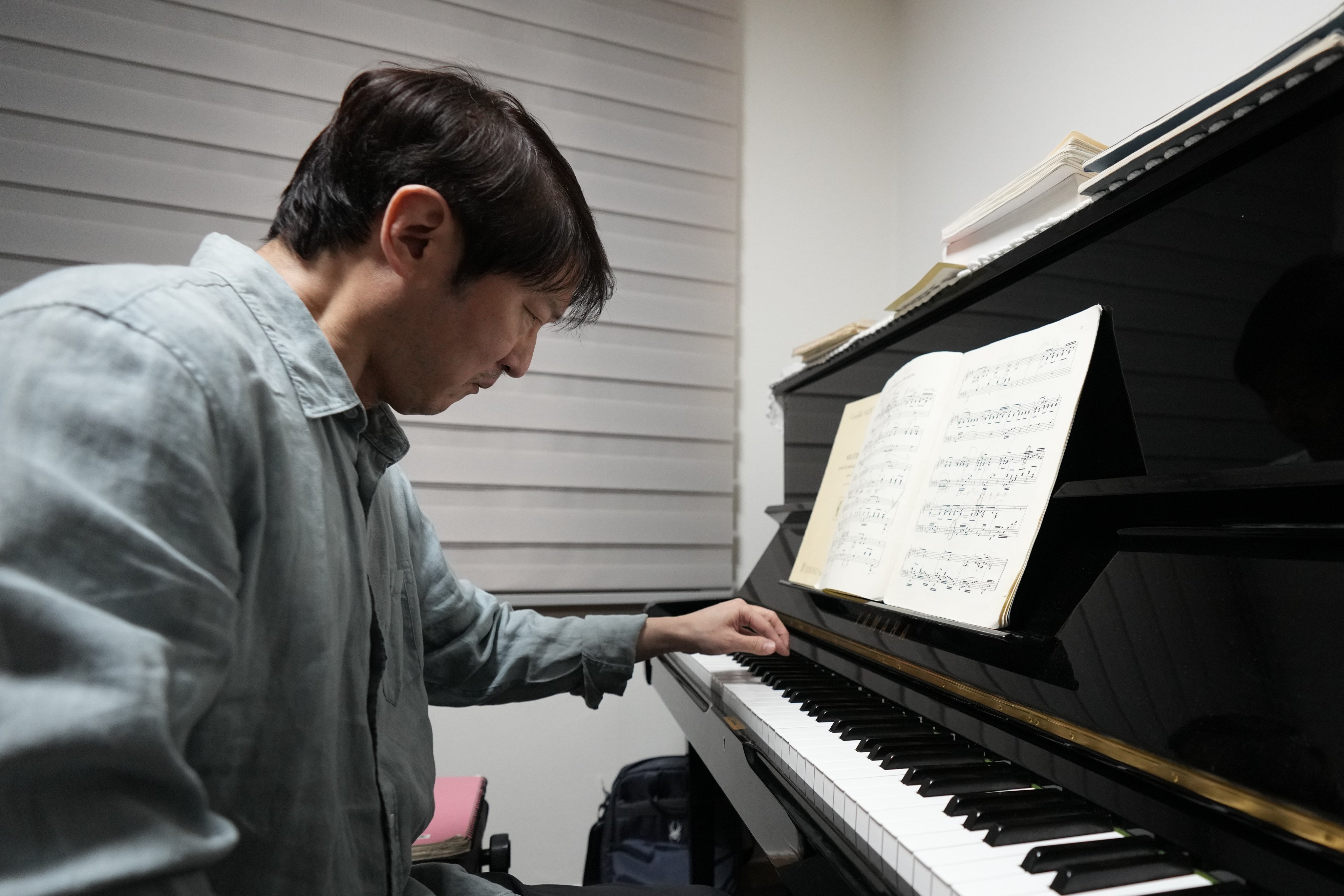 South Korean pianist Lee Hun, who plays with only his left hand after his right side was paralysed by a stroke, is now preparing for a new challenge: his first joint performance with an orchestra at an international music festival next month. Photo: AP