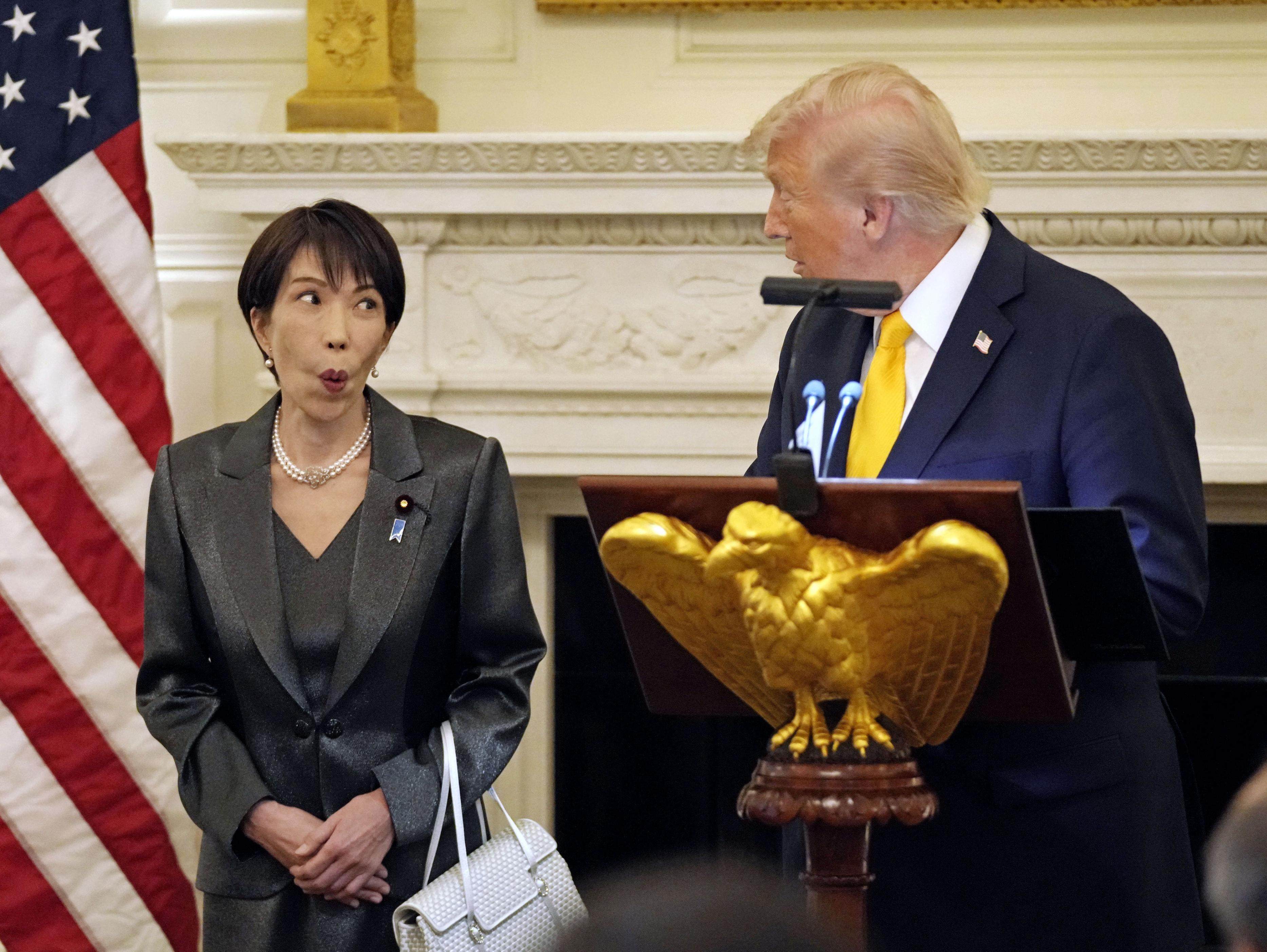 Japanese Prime Minister Sanae Takaichi and US President Donald Trump share a glance during remarks at White House dinner on March 19. Photo: Kyodo