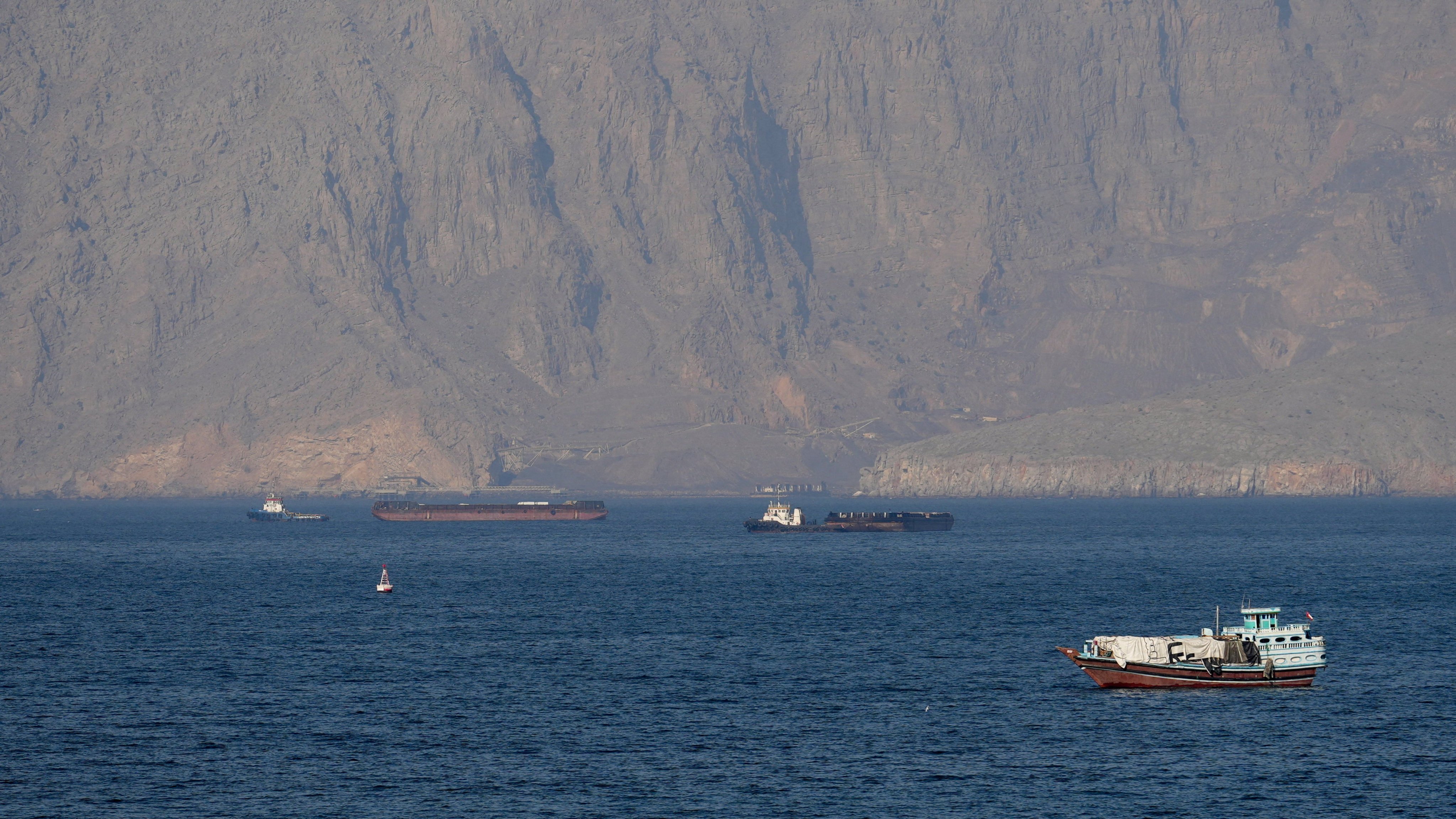 Ships and tankers in the Strait of Hormuz off the coast of Musandam, Oman, on Sunday. Photo: Reuters