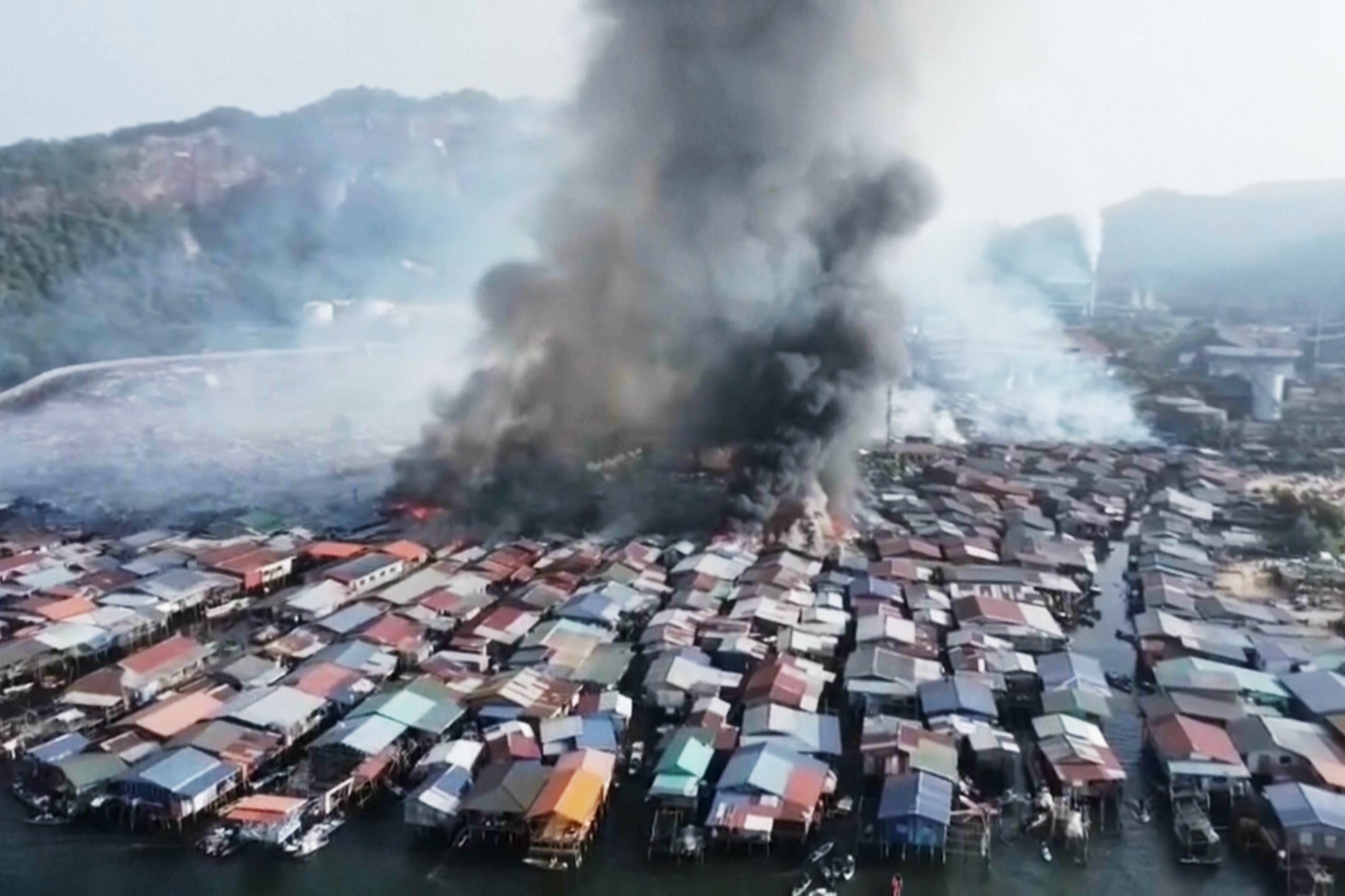 This image made from video provided by Bernama TV shows a fire at a Malaysian coastal settlement in the Sandakan district of Sabah state on Borneo Island, Malaysia, Sunday, April 19, 2026. (Bernama TV via AP)