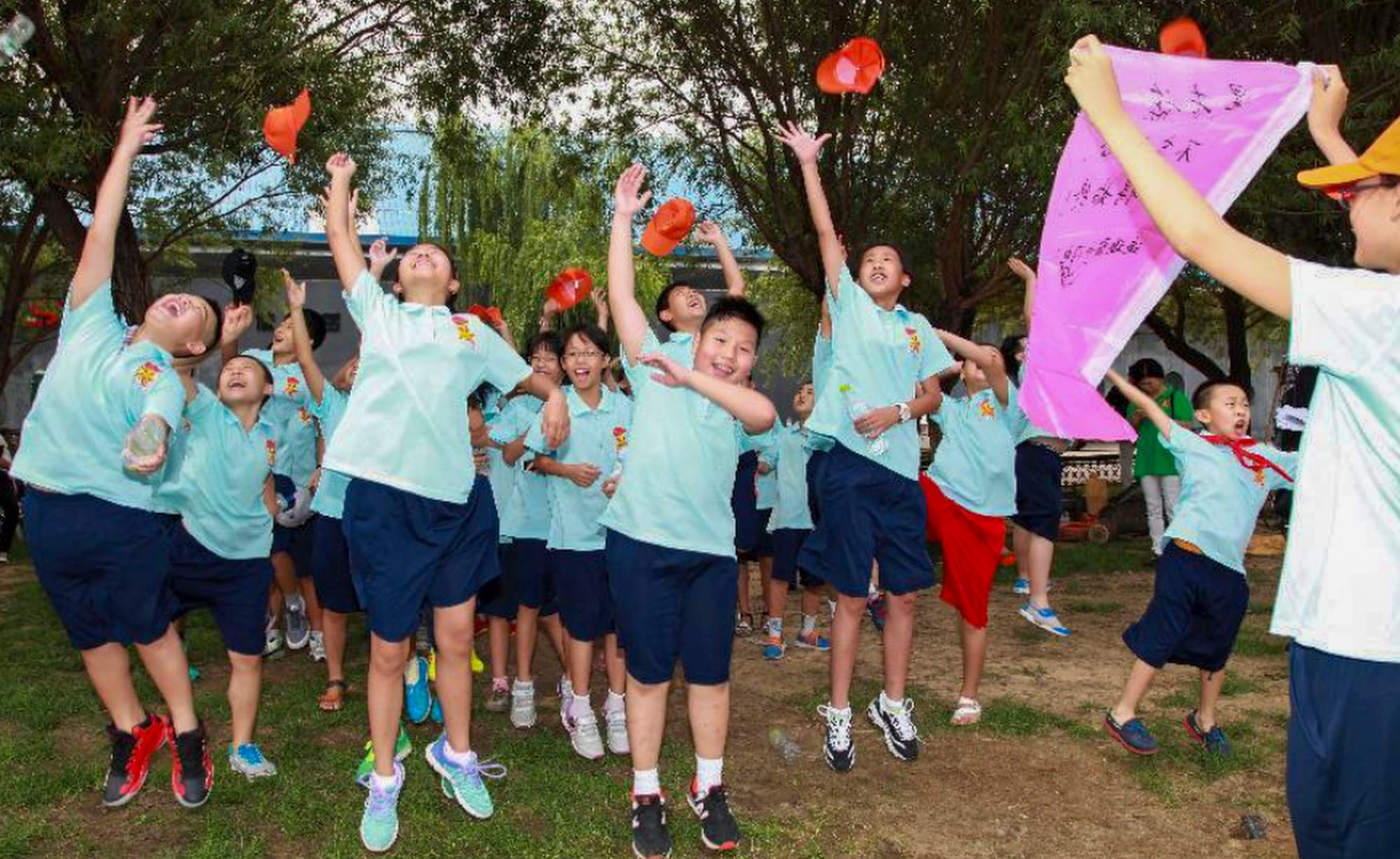 Pupils enjoying games during a summer camp in Beijing. Photo: Xinhua