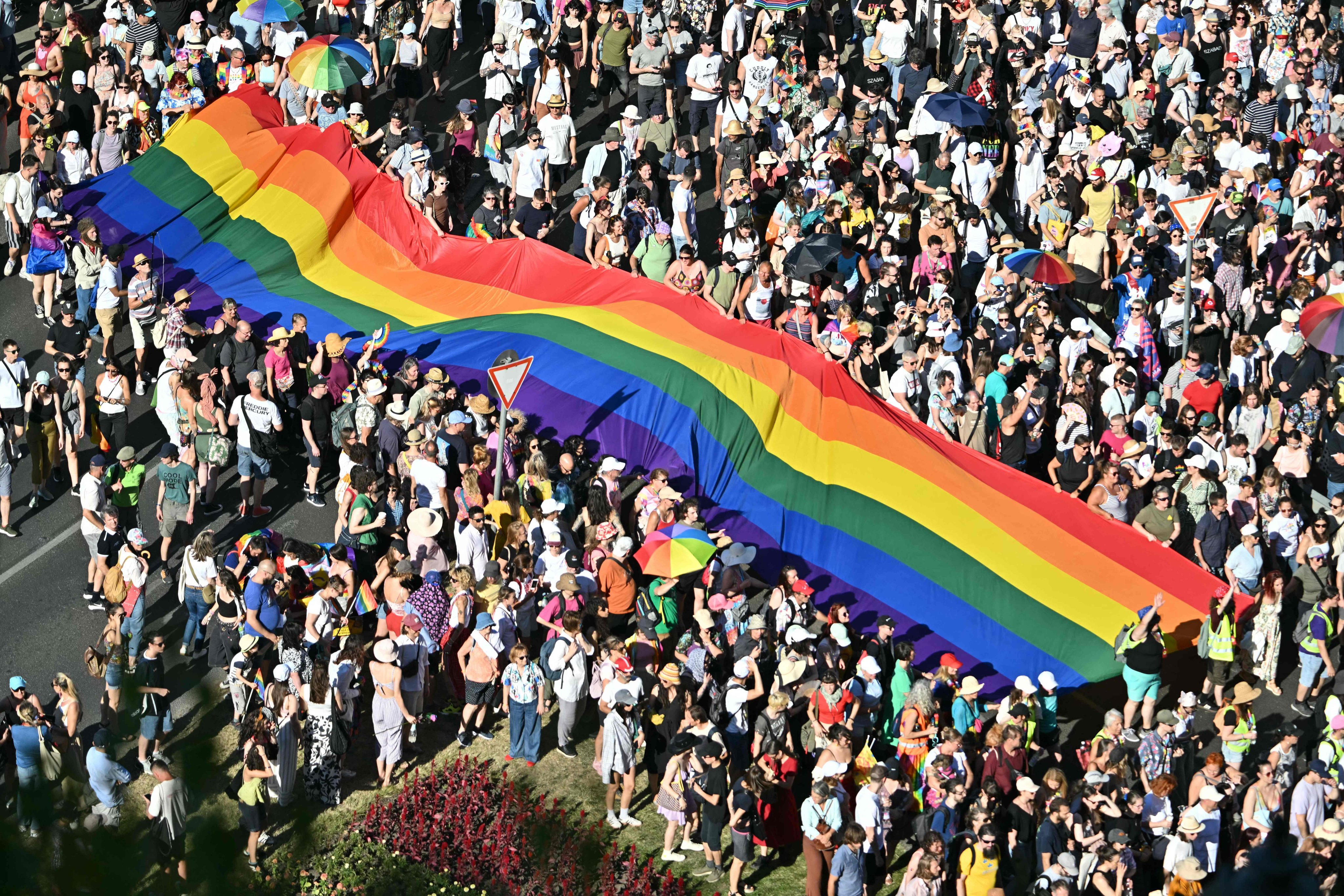 People carry a Rainbow flag at the Budapest Pride parade held in Hungary’s capital last year. Photo: AFP