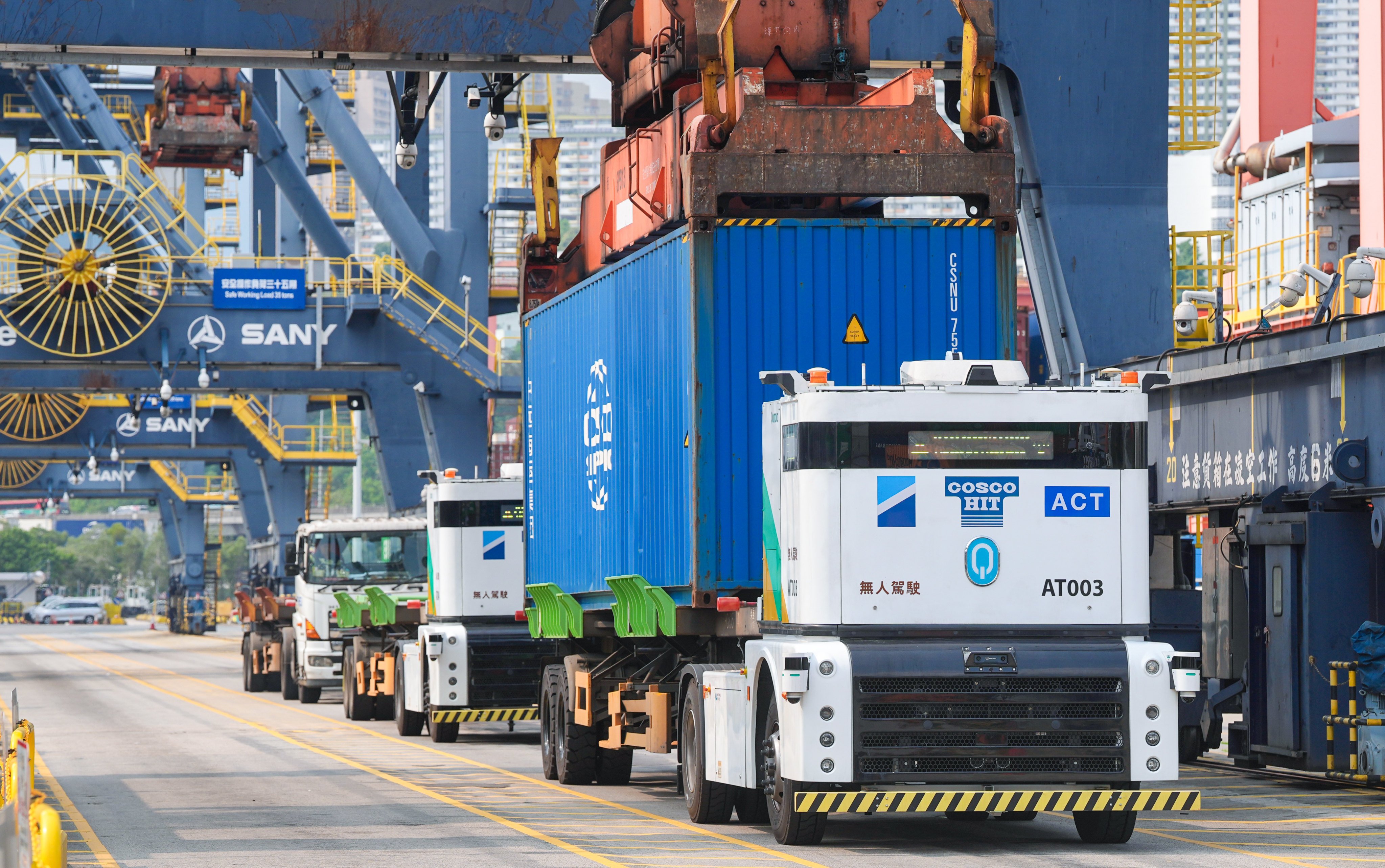 Containers being loaded on to the AI-powered autonomous trucks at Kwai Tsing Terminal. Photo: Elson Li