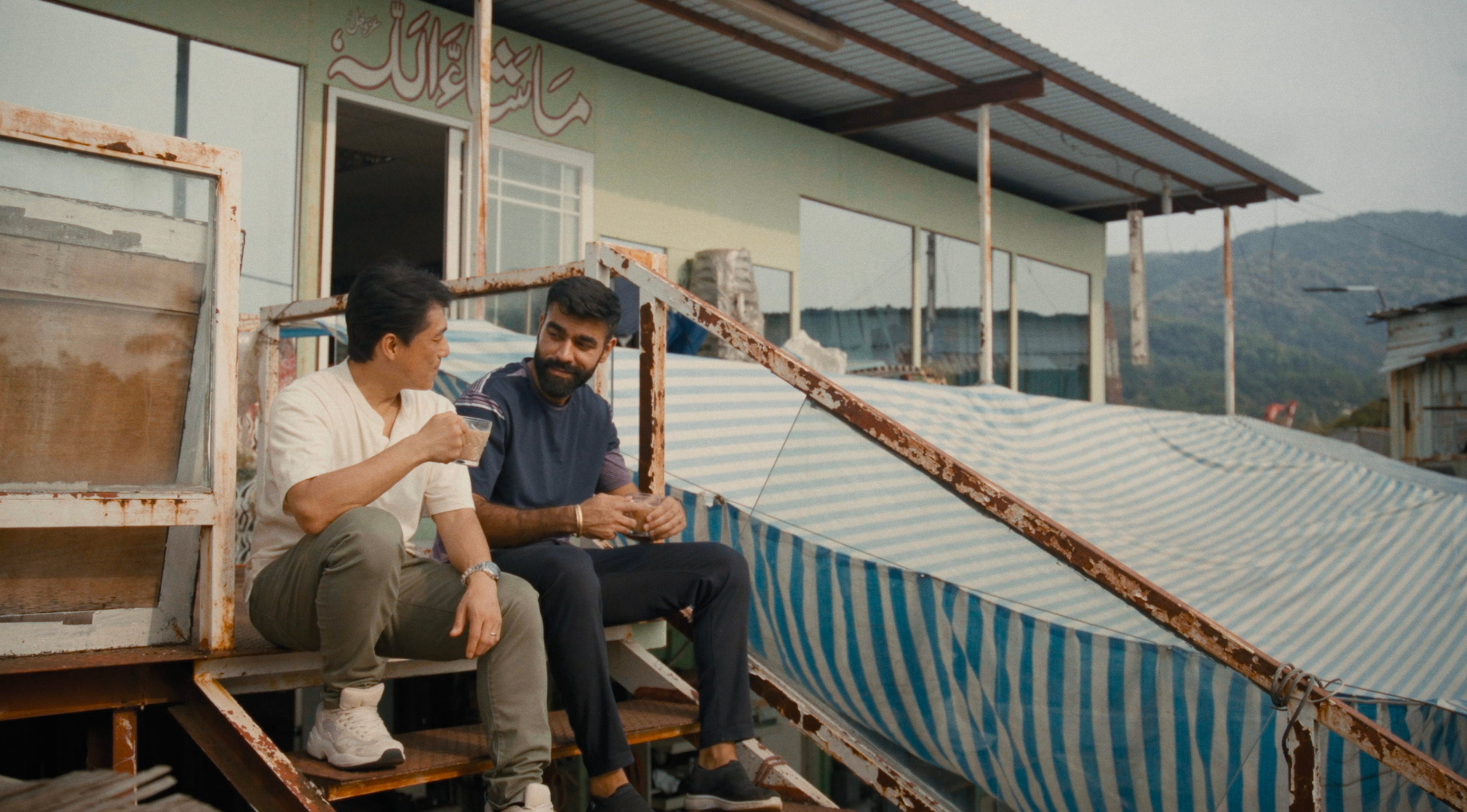 Chris (Kenneth Cheung, left) befriends Singh (Inderjeet Singh) in a still from Let’s Have a Cup of Doodh Patti Chai. Photo: Brian Hung