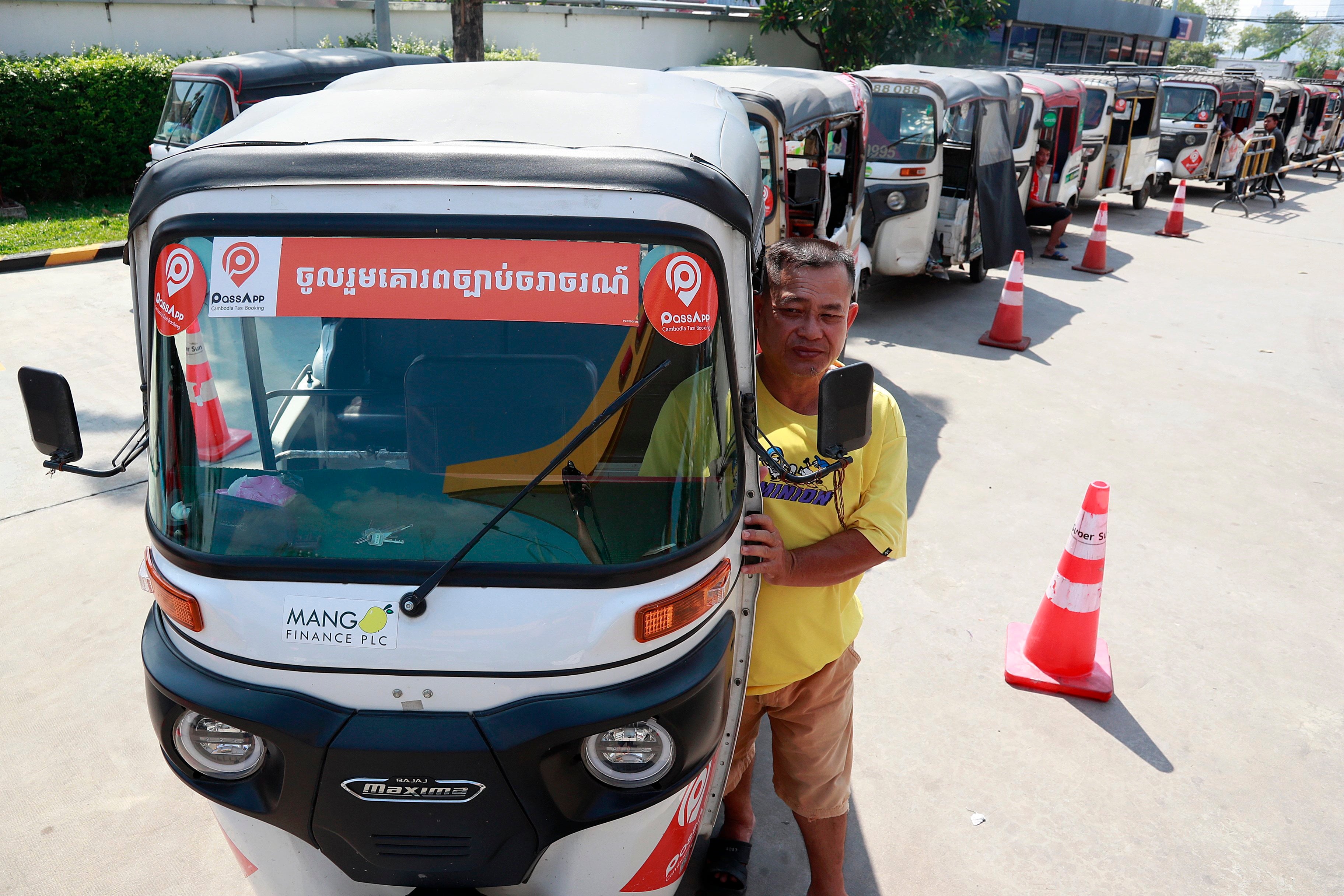Vehicles line up to fill LPG at a fuel station in Phnom Penh, Cambodia, last month. Photo: EPA