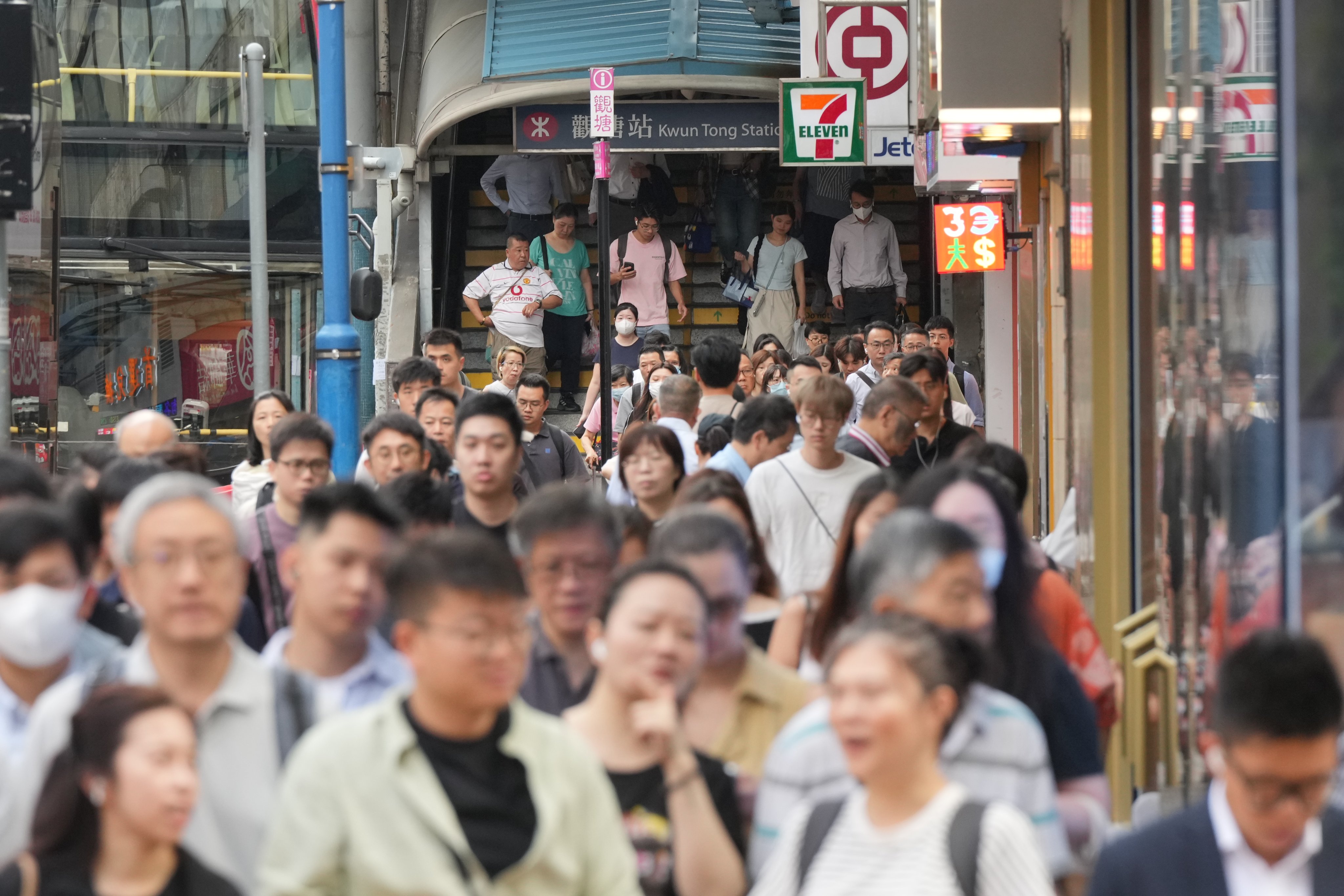 People head to work during the morning rush hour in Kwun Tong on October 14, 2025. Photo: May Tse