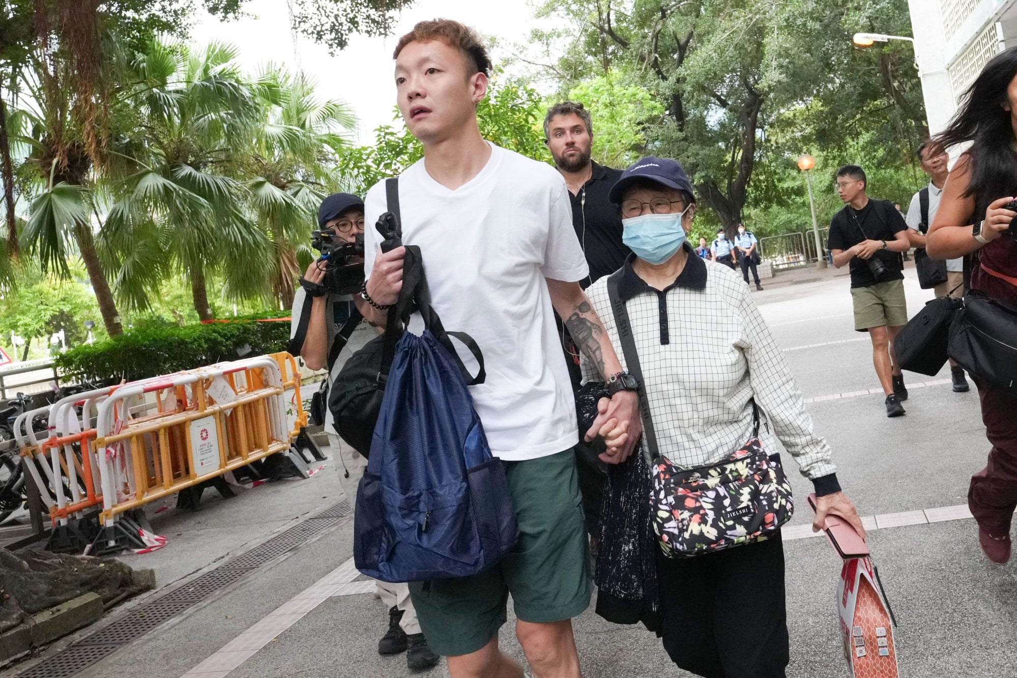 A resident surnamed Cheung with his grandmother. Photo: Jelly Tse