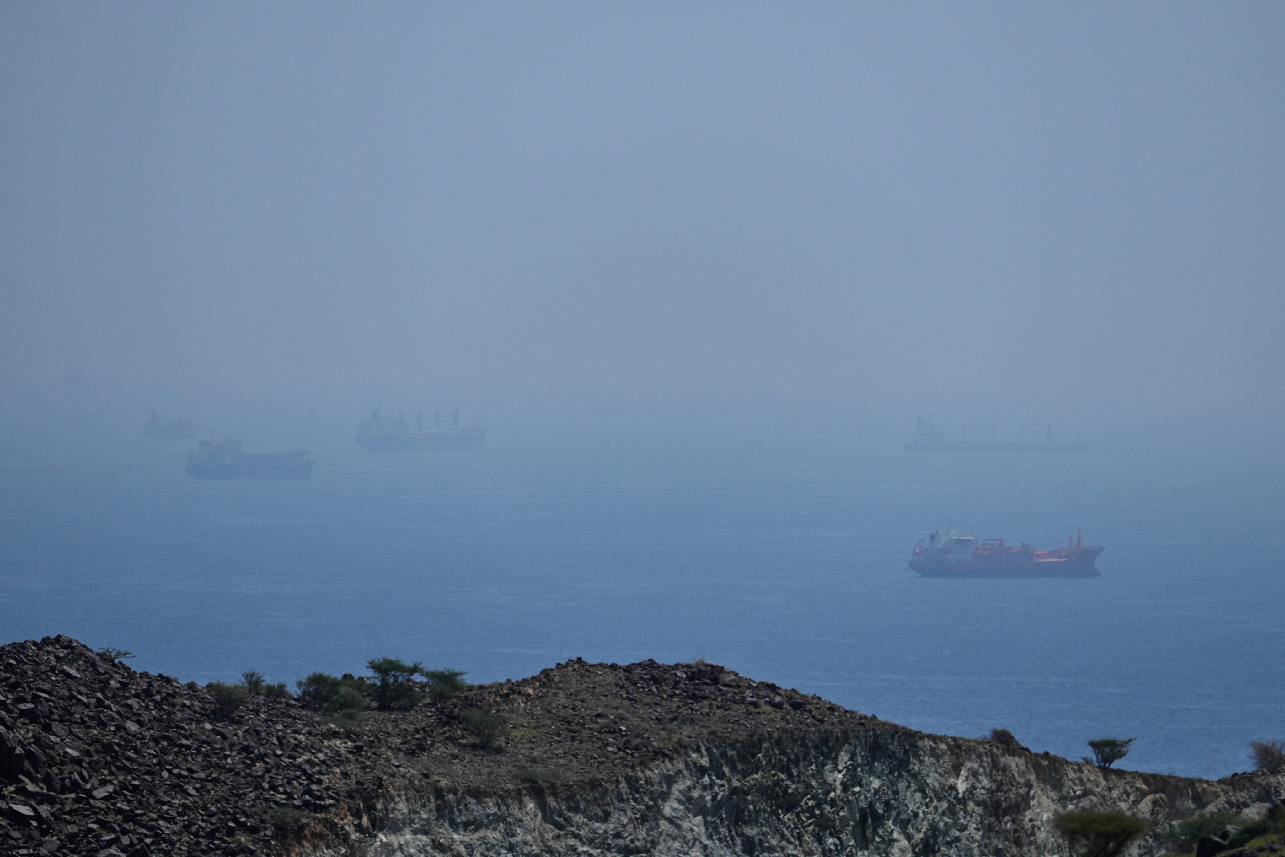 Tankers and bulk carriers are anchored in the Strait of Hormuz on April 18. Photo: AP