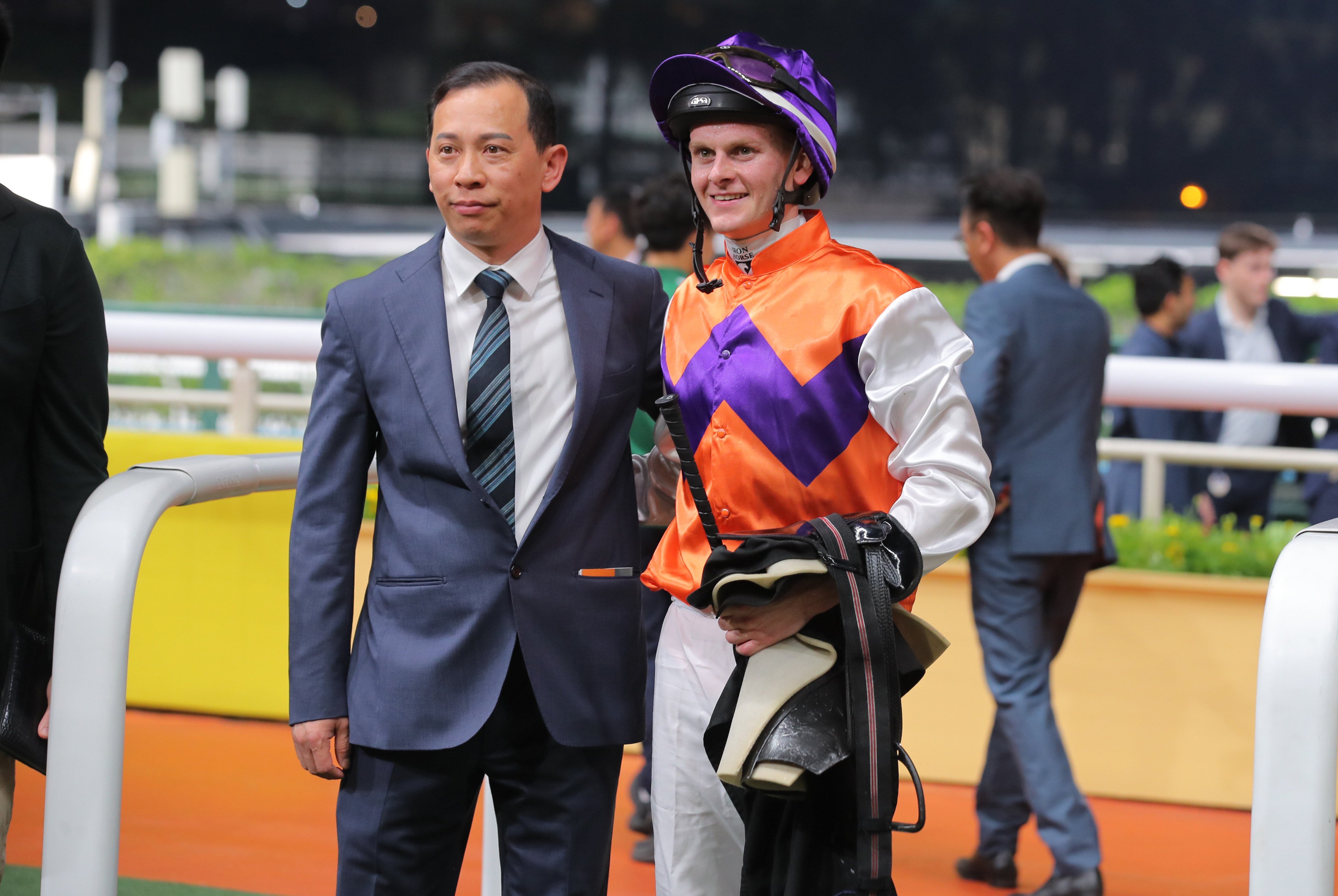 Jockey Ethan Brown celebrates his first Hong Kong win with trainer Cody Mo. Photos: Kenneth Chan