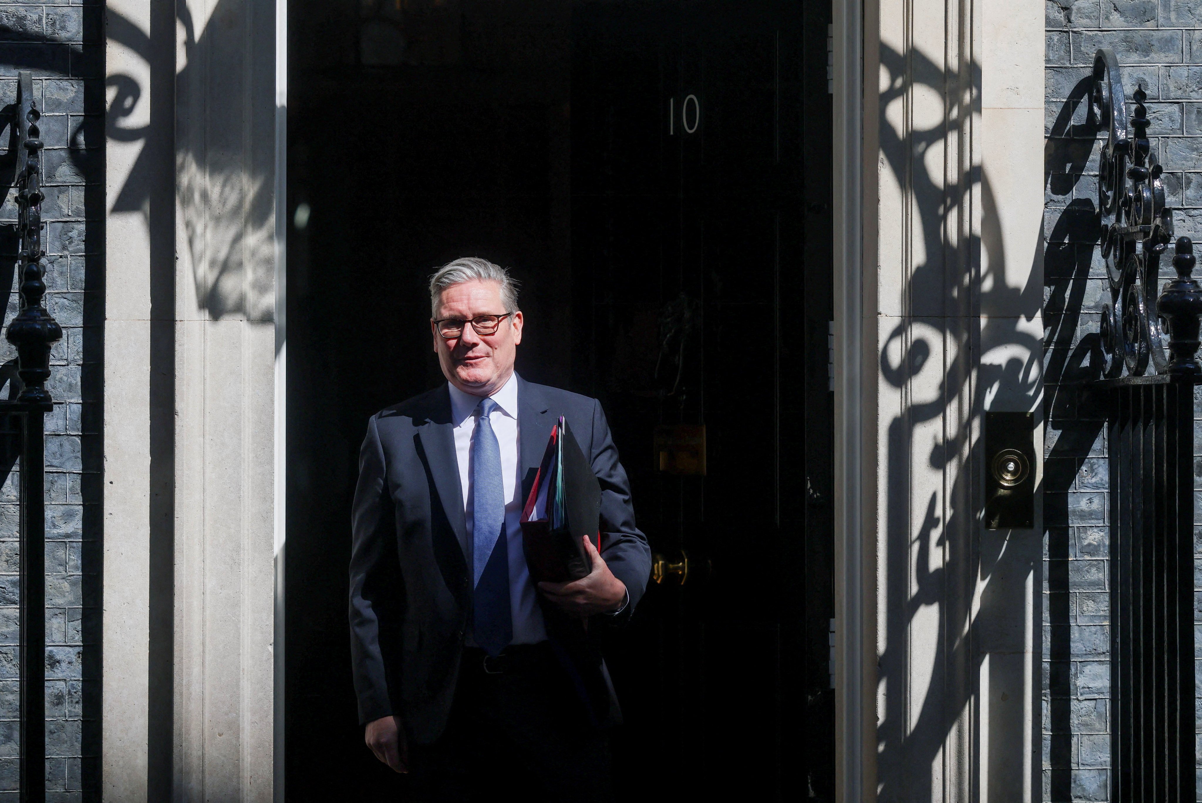 British Prime Minister Keir Starmer walks outside 10 Downing Street in Britain on Wednesday. Photo: Reuters