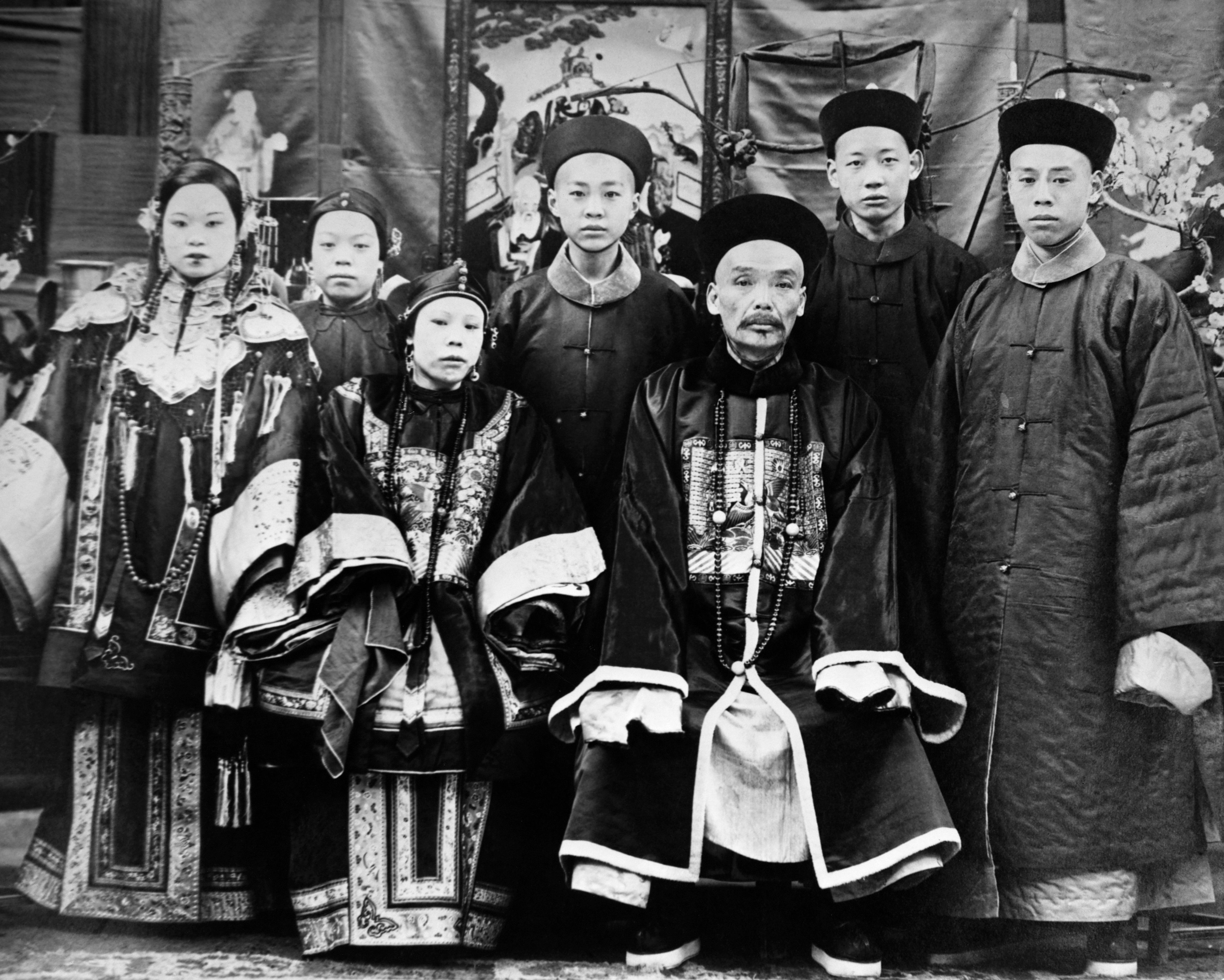 An ancient Chinese public official, with a moustache, and his wife and children. Photo: Getty Images