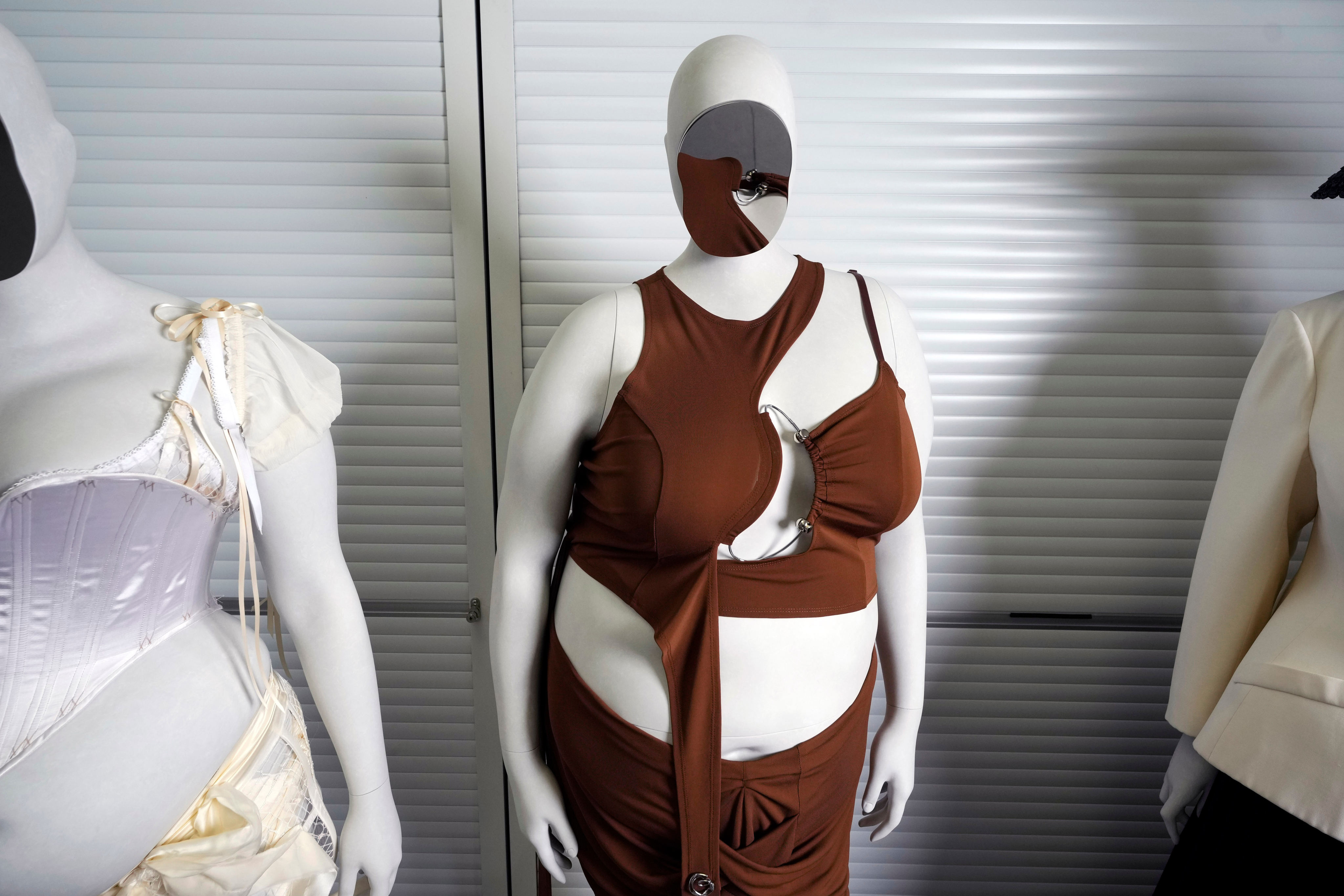 An ensemble by designer Karoline Vitto appears on a mannequin model of plus-size model Charlie Reynolds (centre) at the Metropolitan Museum of Art during preparations for the coming Met Gala exhibition titled “Costume Art”. Photo: Charles Sykes/Invision/AP