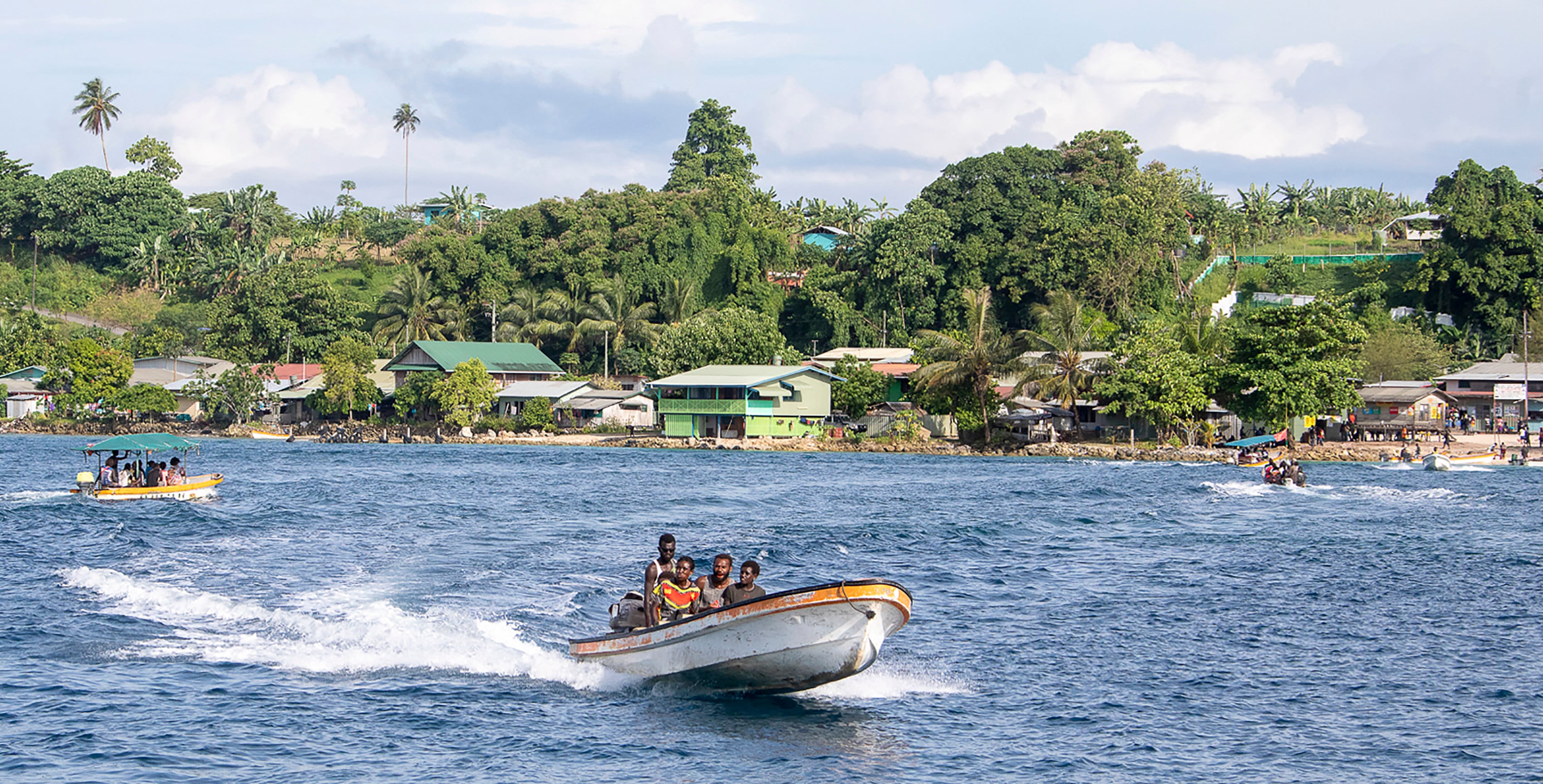 Boats ply the waterway in Buka, Papua New Guinea. Many Pacific Island communities rely on boat transport for movement. Photo: AFP