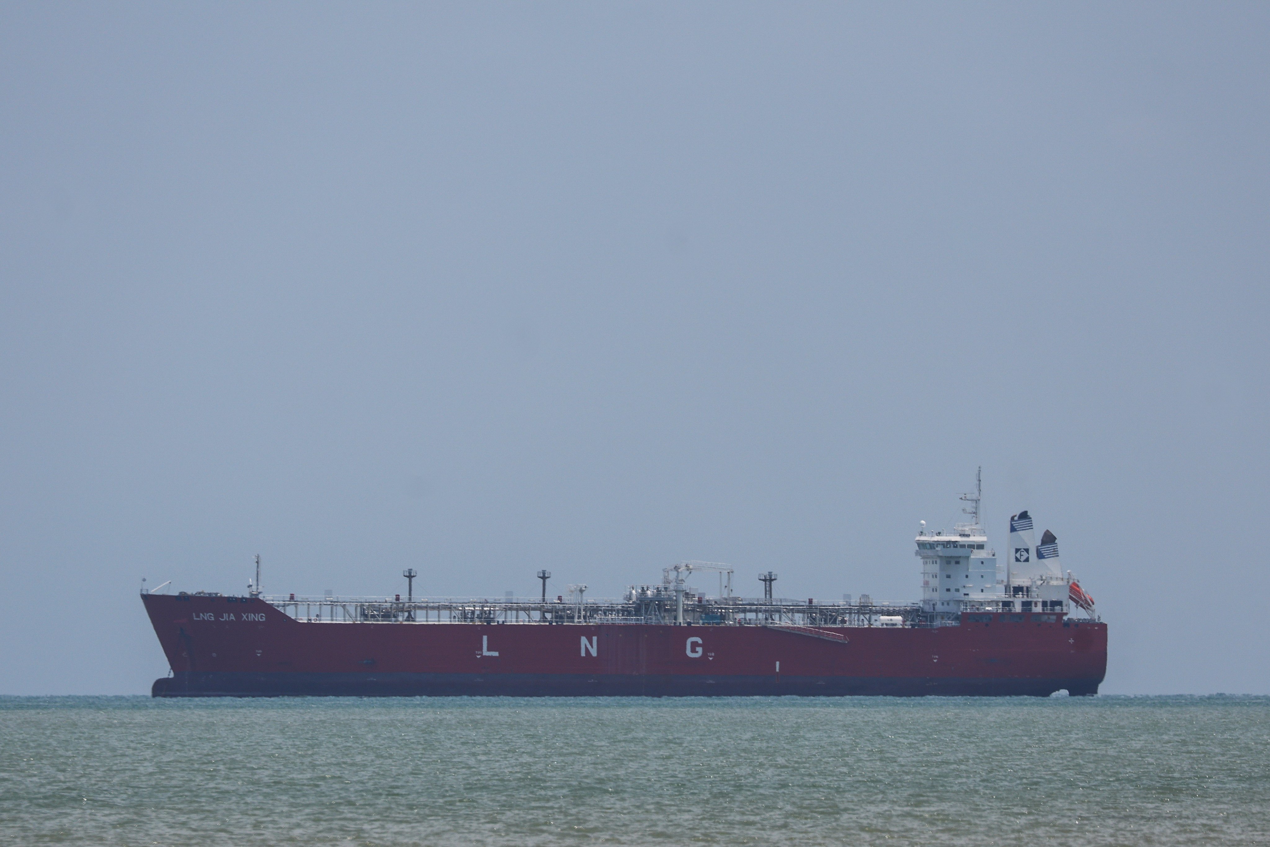 The liquefied natural gas tanker LNG Jia Xing passes through the Strait of Malacca, a route for most of China’s maritime trade and energy imports. Photo: EPA