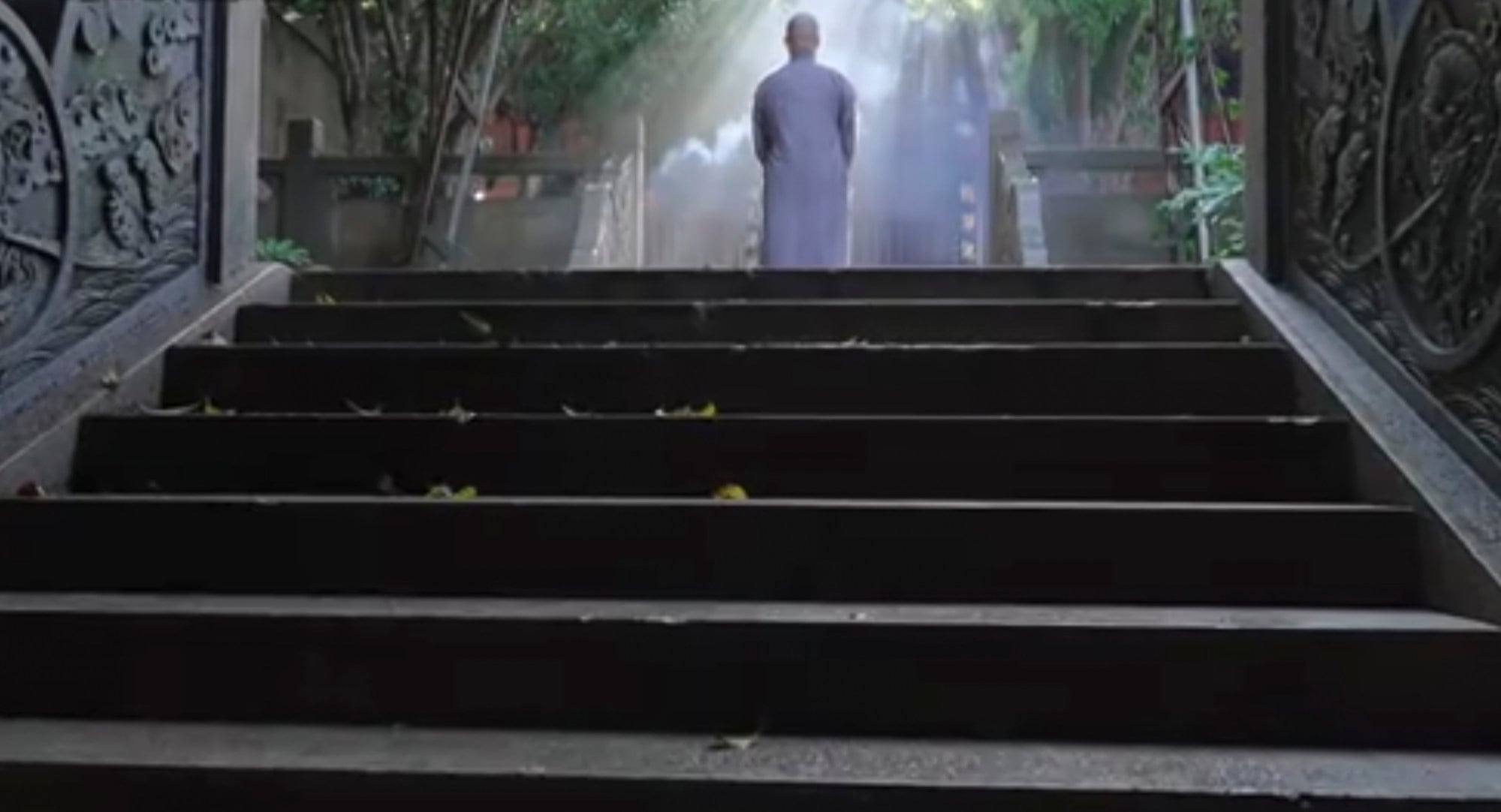Huayan pictured at the top of some steps. He says the game allows him to connect with others. Photo: Baidu