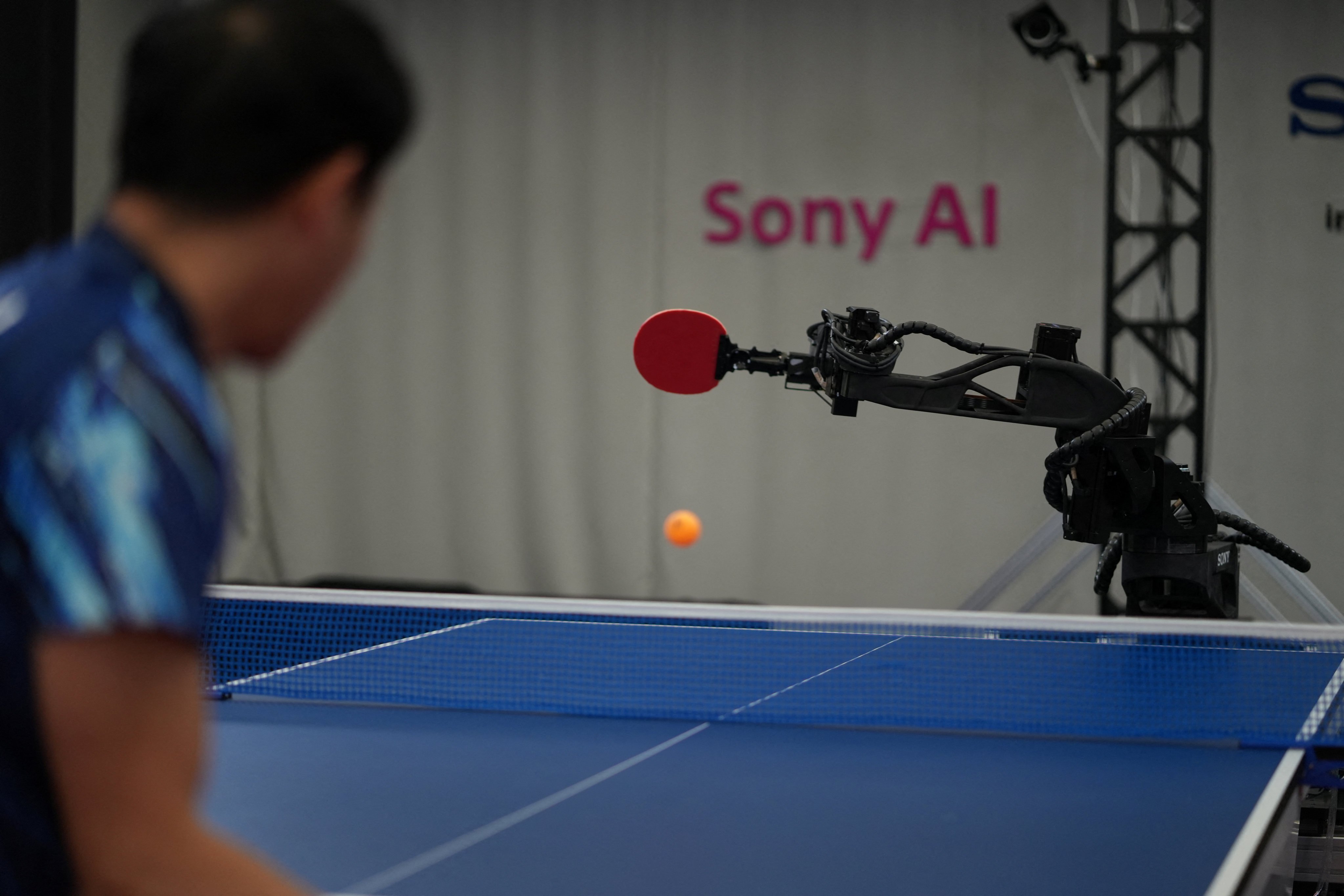 Sony AI autonomous robot Ace returns a shot back against its human opponent, table tennis player Yamato Kawamata, during a match in December 2025, as seen in this photograph released on April 22, 2026. Sony AI/Handout via REUTERS     NO RESALES. NO ARCHIVES. THIS IMAGE HAS BEEN SUPPLIED BY A THIRD PARTY