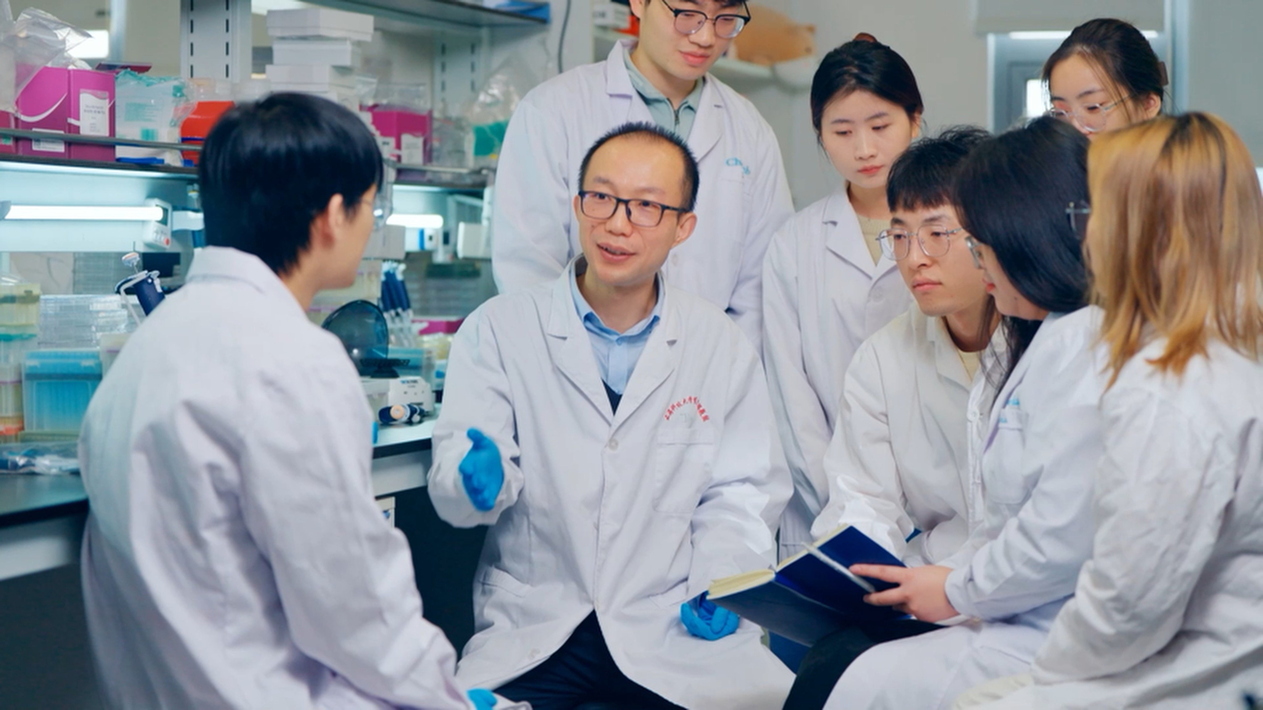 Professor Chen Jia (centre), the brain behind the development of the CS-101 therapy. Photo: Handout