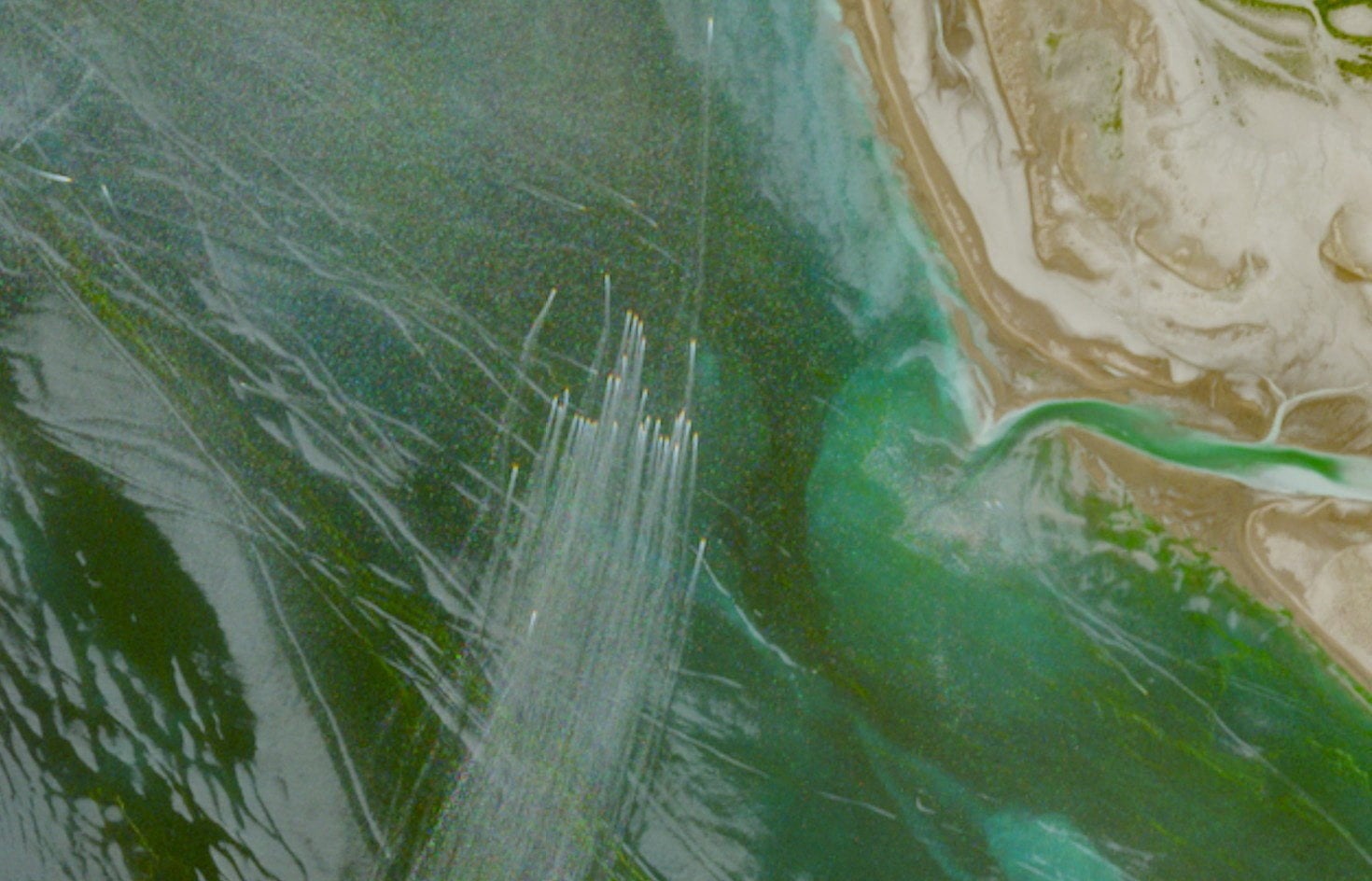 A satellite image shows a fleet of small boats at sea, north of the Strait of Hormuz near the Kargan coast, Iran. Photo: European Union/Copernicus Sentinel-2 via Reuters