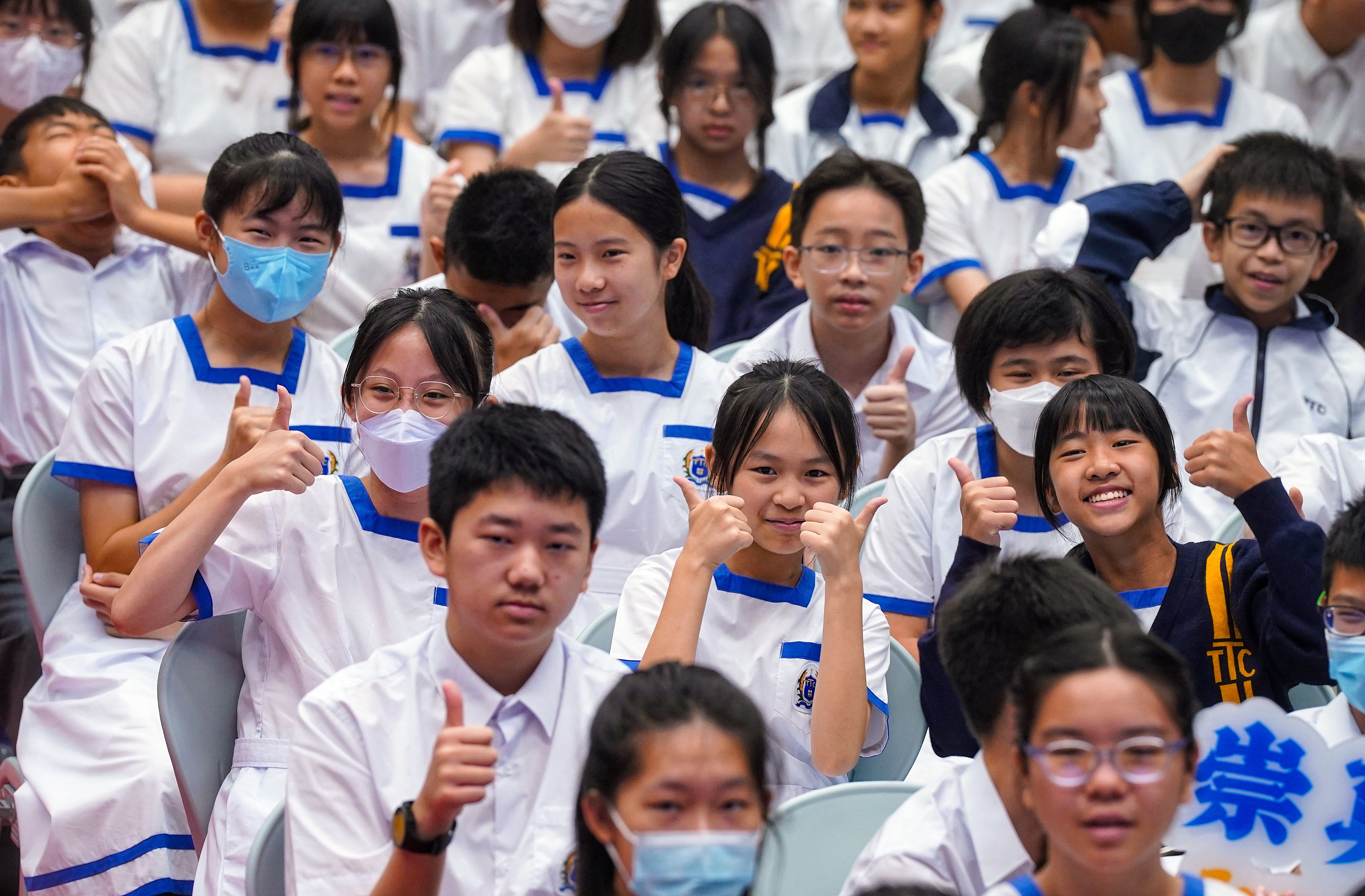 Students of Tsung Tsin College smile on the first day of school in September 2, 2024. Photo: Elson Li