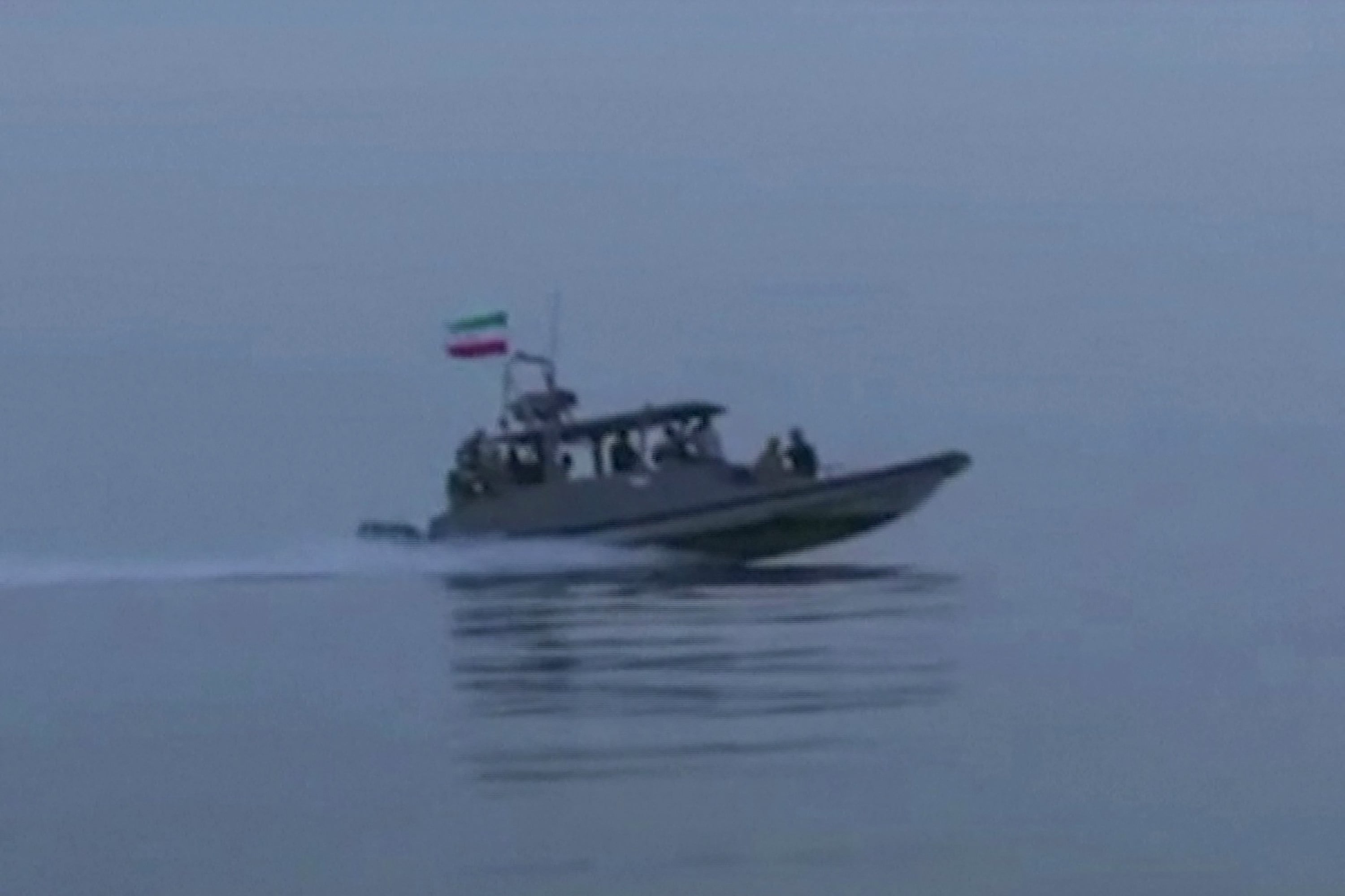 An Islamic Revolutionary Guard Corps fast-attack craft taking part in the seizure of a cargo vessel in the Strait of Hormuz this week. Photo: IRIB TV via AFP