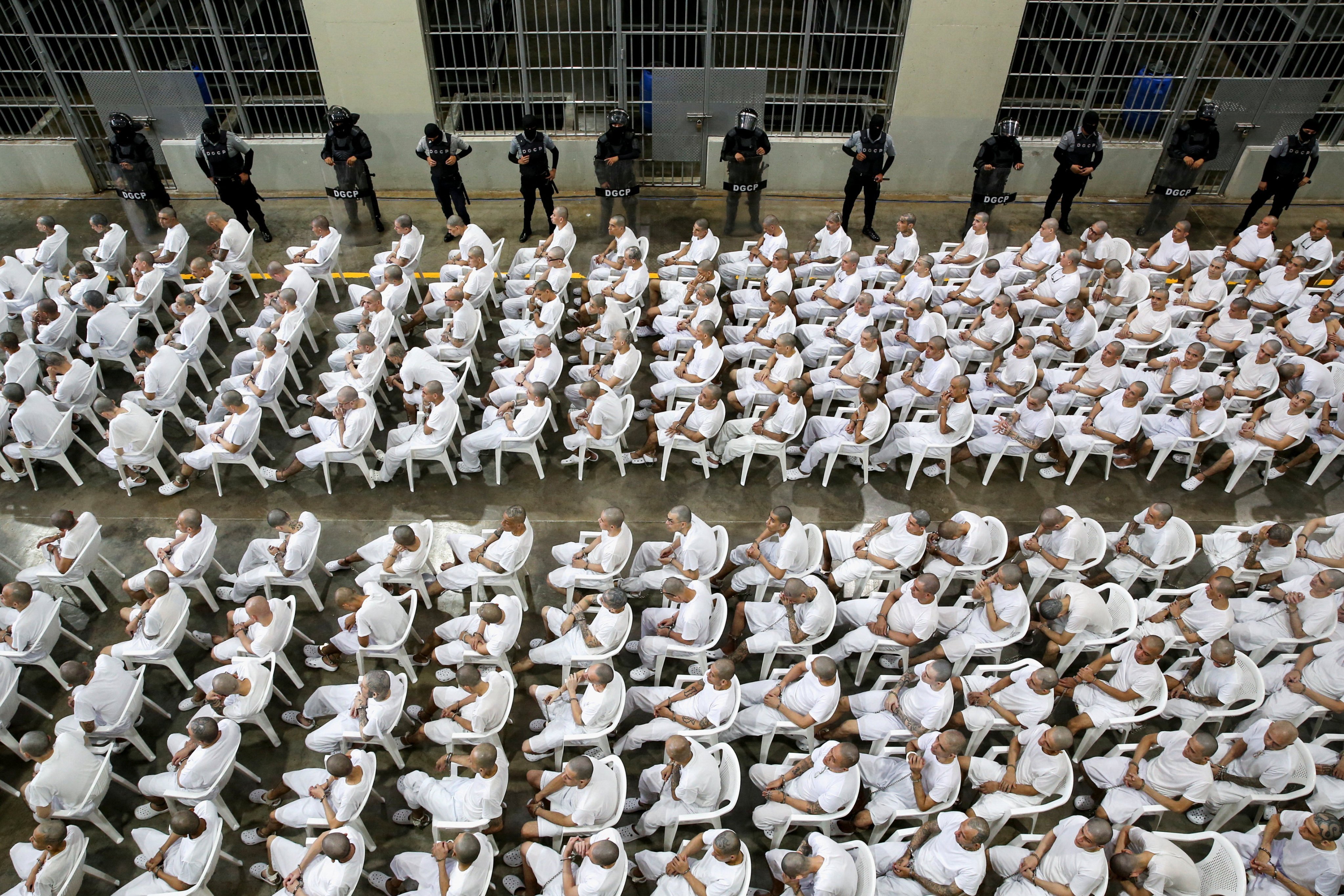Alleged gang members during their mass trial at El Salvador’s CECOT. Photo: Reuters