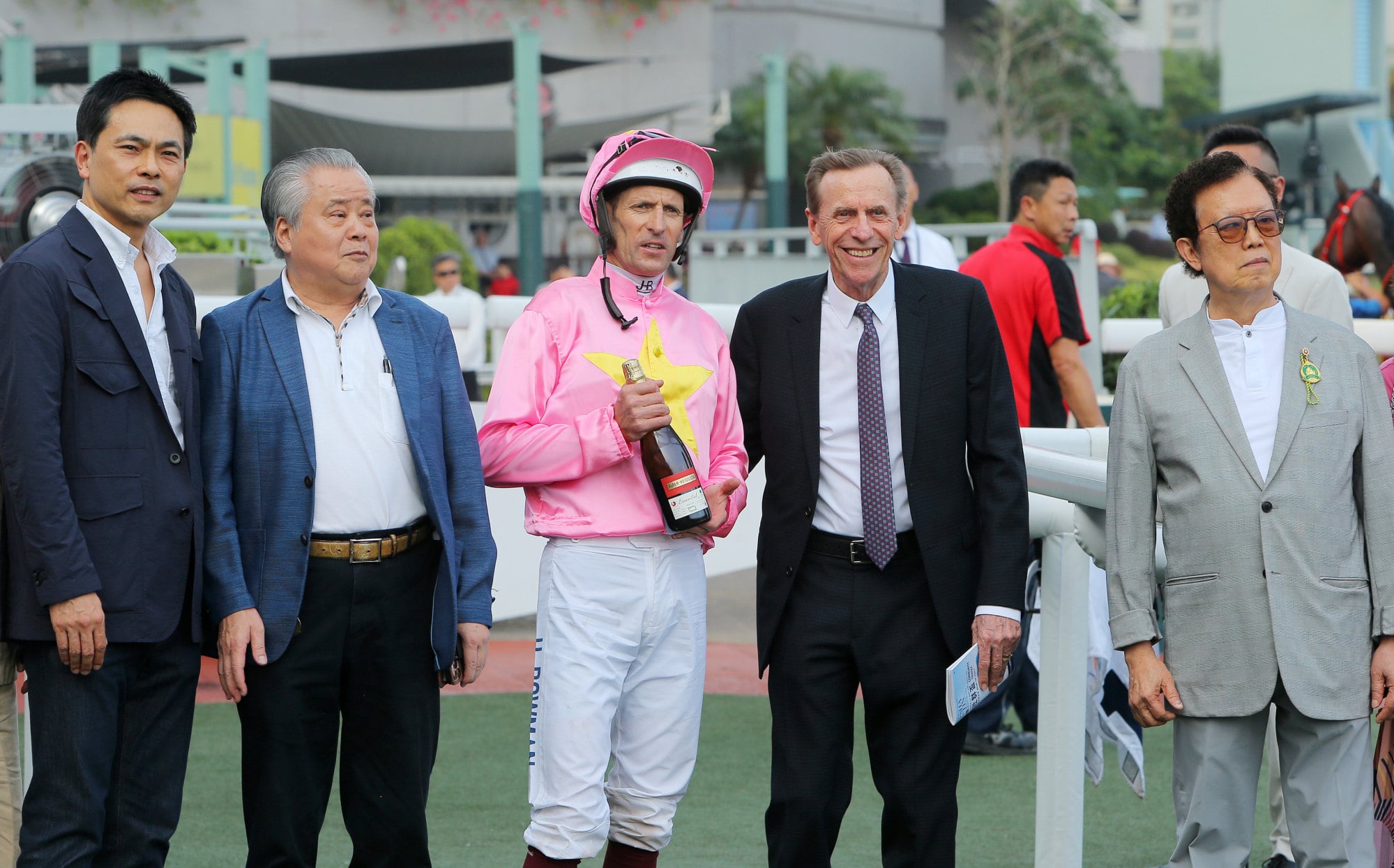 Jockey Hugh Bowman and trainer John Size (second from right) will combine again with Helios Express.