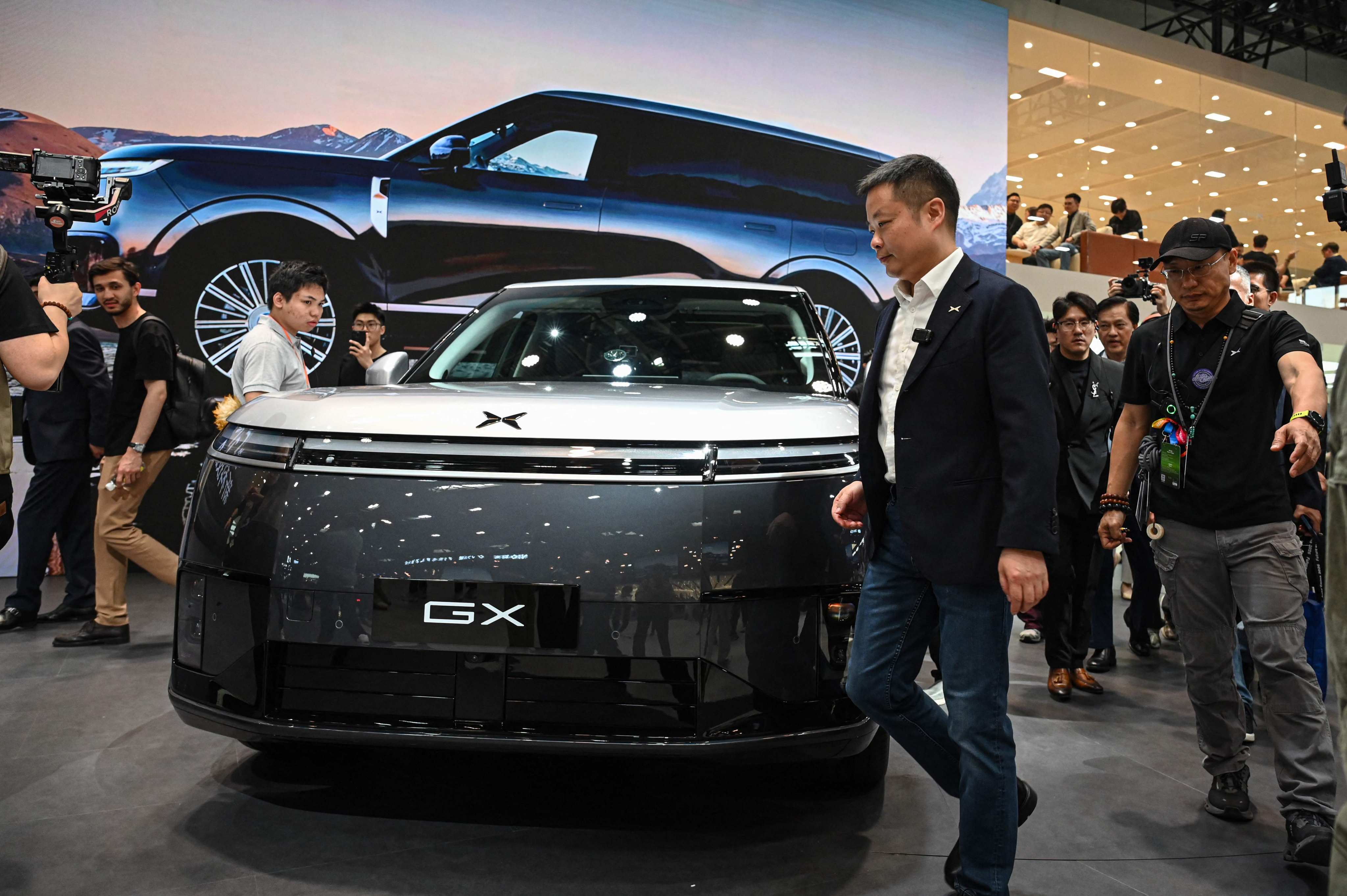 scmp.com - Themis Qi - Xpeng sets August goal to overtake Tesla's self-driving tech in China