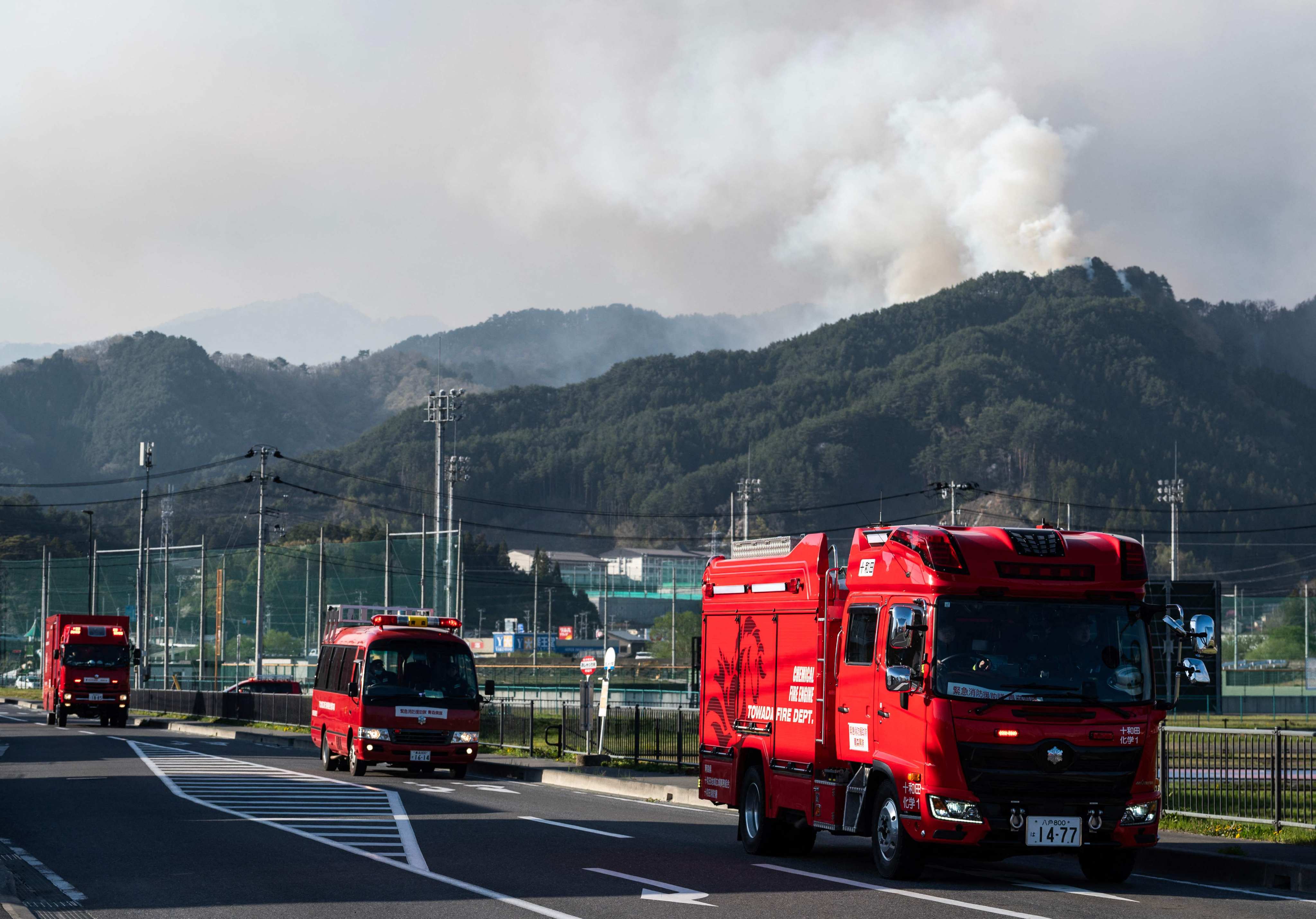 Hundreds of firefighters are battling wildfires in the forests of northern Japan. Photo: AFP