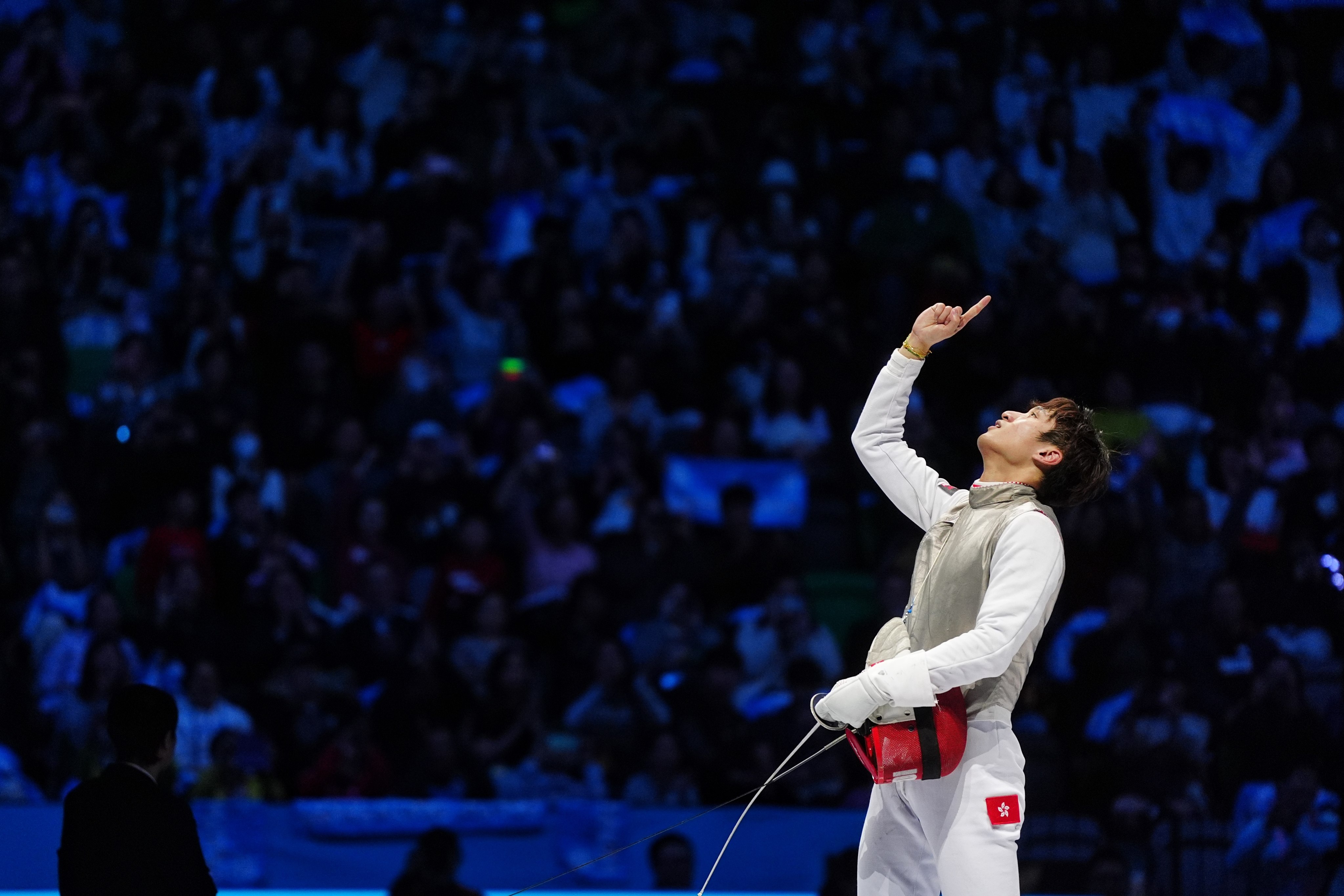 Ryan Choi, here celebrating after Hong Kong claimed men’s team foil gold from last year’s National Games, enjoyed a successful night at the inaugural World Fencing League. Photo: Elson Li